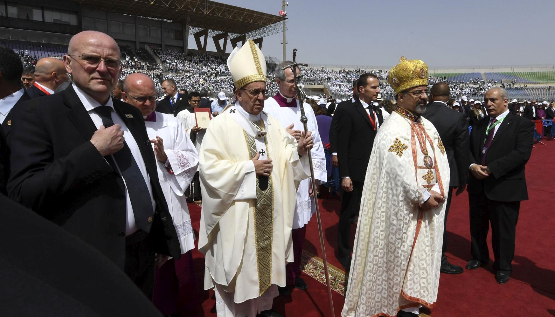 epa05934411 Pope Francis arrives to celebrate Mass for Egypt's Catholic community, at the Air Defense Stadium in Cairo, Egypt, 29 April 2017. Pope Francis is leading a mass in the Air defense stadium attended by 30 thousand people north-east of Cairo on the second day of his two-day visit to Cairo. A day earlier he met with Egyptian President Abdel Fattah al-Sisi, head of the Coptic Orthodox Church Pope Tawadros II, and Grand Imam of al-Azhar Ahmed al-Tayeb. Pope Francis historic visit to the Arab and Muslim majority nation aimed at presenting a united Christian-Muslim front to repudiate violence committed in God's name.  EPA/CIRO FUSCO