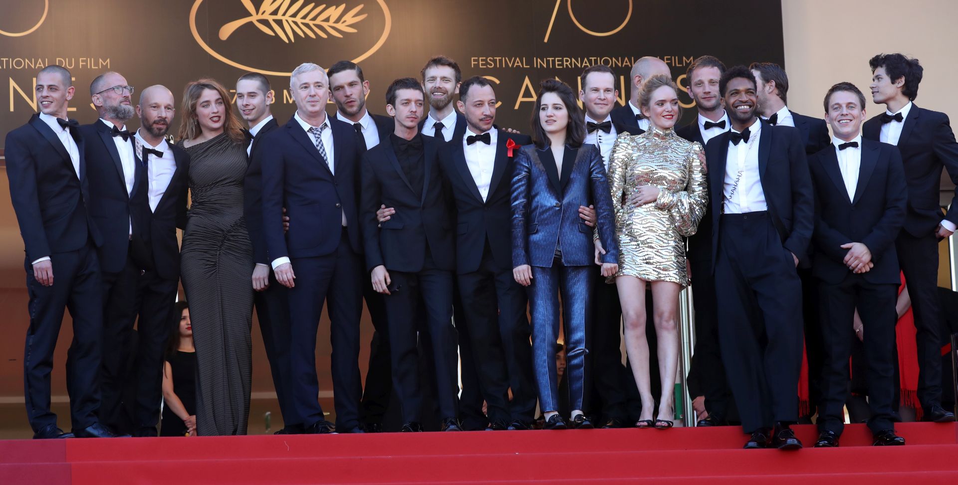 CANNES, FRANCE - MAY 20:  Actor Mehdi Rahim-Silvioli, Act-Up co-founder Didier Lestrade, actor Jean-Francois Auguste,  actress Adele Haenel, actor Ariel Borenstein, director Robin Campillo, actor Arnaud Valois, actor Nahuel Perez Biscayart, actor Antoine Reinartz, actor Julien Herbin, actress Aloise Sauvage, actor Simon Bourgade, actress Coralie Russier, actor Simon Guelat, actor Mehdi Toure, actor Felix Maritaud, actor Jerome Clement and actor Theophile Ray attend the "120 Beats Per Minute (120 Battements Par Minute)" screening during the 70th annual Cannes Film Festival at Palais des Festivals on May 20, 2017 in Cannes, France.  (Photo by Neilson Barnard/Getty Images)