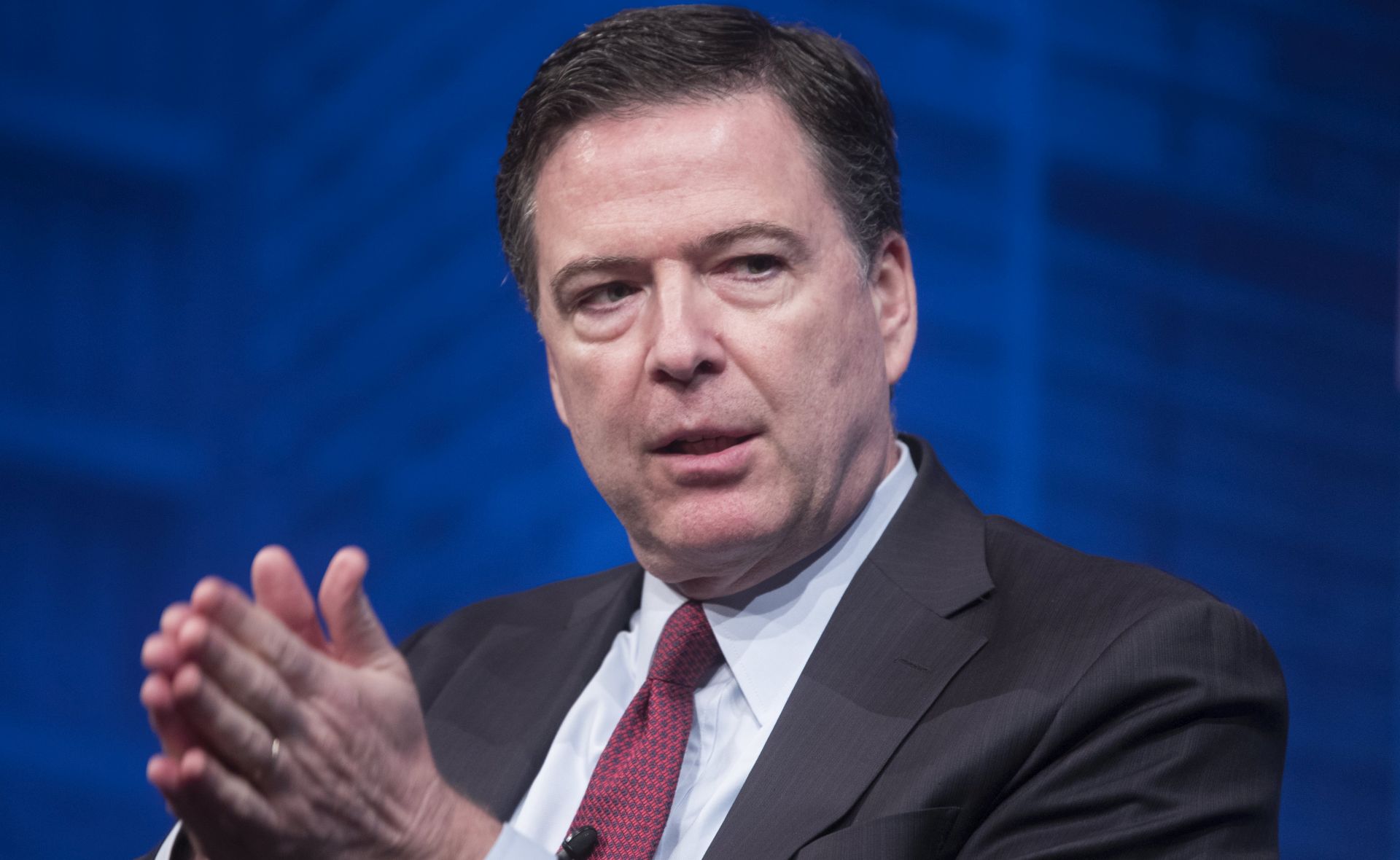 epa05905276 Director of the Federal Bureau of Investigation (FBI) James Comey participates in a panel discussion at the premiere screening of the television show, 'Inside the FBI - New York', at the Newseum in Washington, DC, USA, 12 April 2017.  EPA/MICHAEL REYNOLDS