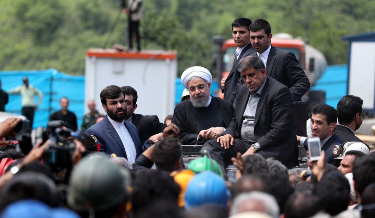 epa05948175 A handout photo made available by the presidential official website shows Iranian President Hassan Rouhani (C) talking with mine workers as he visits the Azadshahr coal mine in the city of Golestan, northern Iran, 07 May 2017.Media reported that about 35 mine workers died in an explosion in the mine on 03 May 2017.  EPA/PRESIDENTIAL OFFICIAL WEBSITE HANDOUT  HANDOUT EDITORIAL USE ONLY/NO SALES