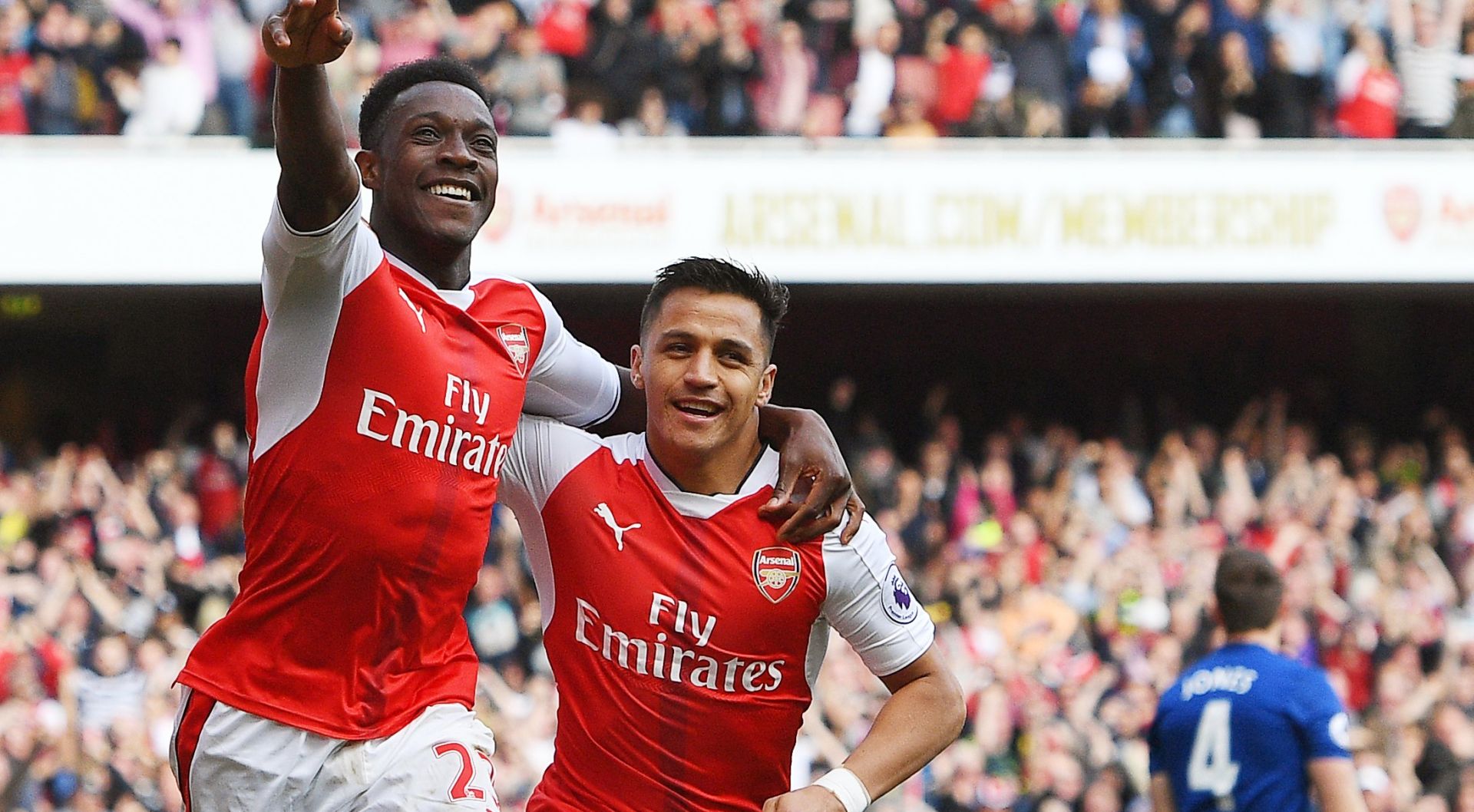 epa05948855 Arsenal's Danny Welbeck (L) celebrates with his teammate Alexis Sanchez (R) after scoring the 2-0 lead during the English Premier League soccer match between Arsenal FC and Manchester United in London, Britain, 07 May 2017.  EPA/FACUNDO ARRIZABALAGA EDITORIAL USE ONLY. No use with unauthorized audio, video, data, fixture lists, club/league logos or 'live' services. Online in-match use limited to 75 images, no video emulation. No use in betting, games or single club/league/player publications.