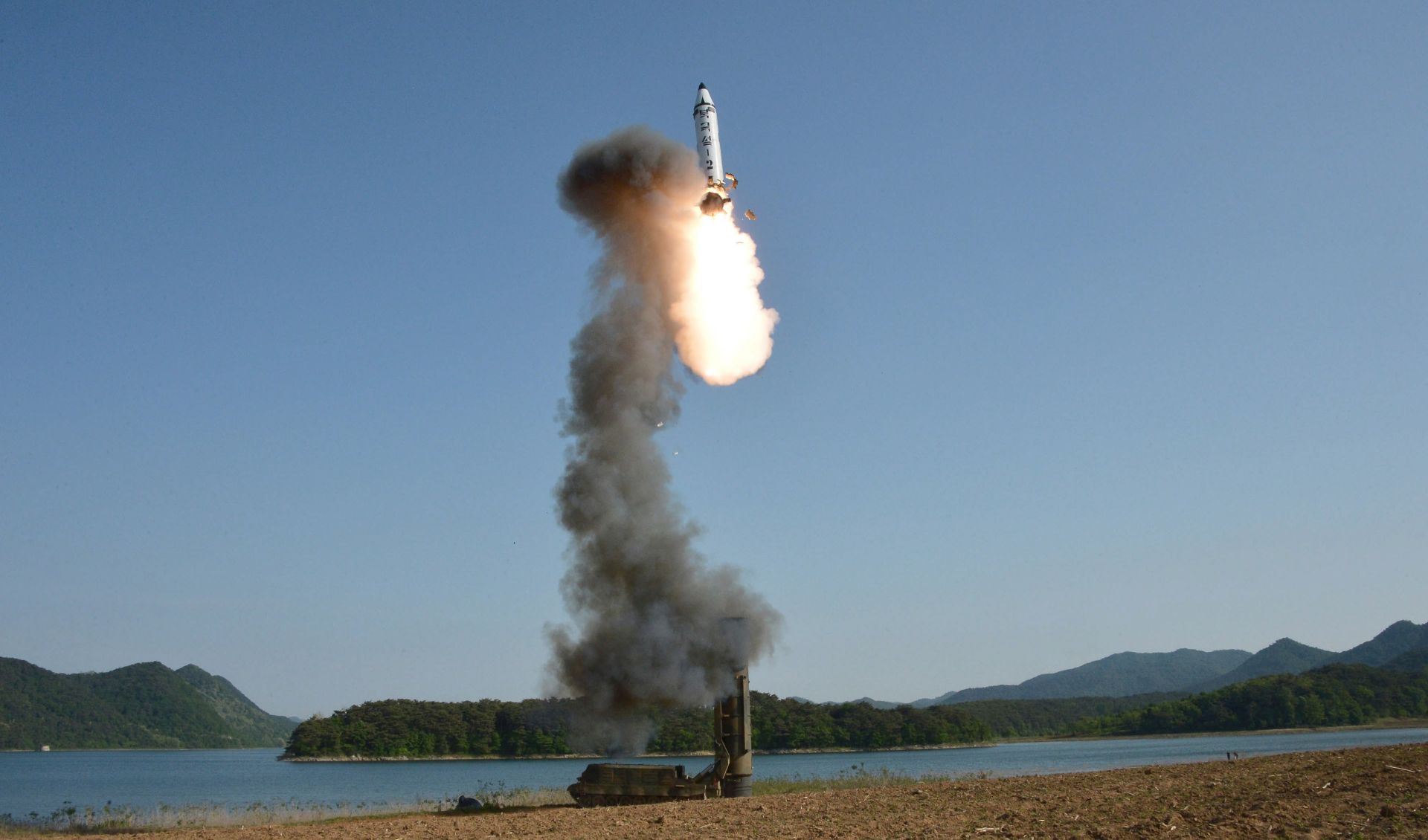 epa05981199 An undated image made available by the North Korean official news agency KCNA on 22 May 2017 shows the test-fire of the ground-to-ground medium-to-long range strategic ballistic missile Pukguksong-2 at an undisclosed location in North Korea. According to South Korea's Military, North Korea launched a ballistic missile on 21 May that flew more than 500km towards the Sea of Japan, the same type of missile reportedly test-launched on 12 February. The model, a Pukguksong-2, also known as a KN-15 missile, is an upgraded version of a submarine-launched ballistic missile (SLBM) using a solid fuel engine. North Korean state media confirmed the launch as 'successful' adding that the weapon was ready to be deployed for military action, media reported.  EPA/KCNA   EDITORIAL USE ONLY