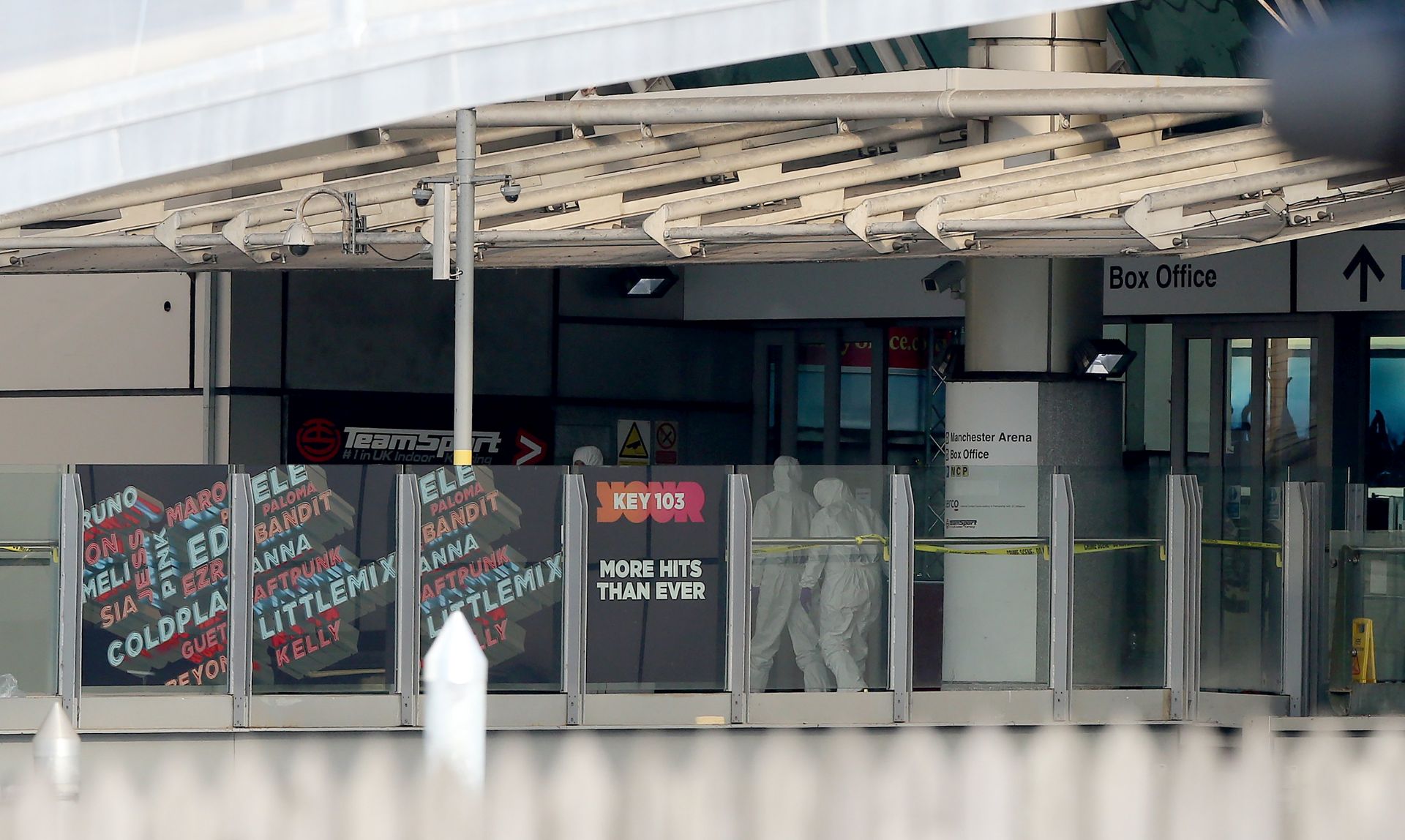 epa05982780 Forensic officers enter the Manchester Arena in Manchester, Britain, 23 May 2017. According to a statement by the Greater Manchester Police, at least 22 people have been confirmed dead and around 59 others were injured, in an explosion at the Manchester Arena on the night of 22 May at the end of a concert by US singer Ariana Grande. Police believe that the explosion, which is being treated as a terrorist incident, was carried out by a single man using an improvised explosive device (IED), who was confirmed dead at the scene.  EPA/NIGEL RODDIS