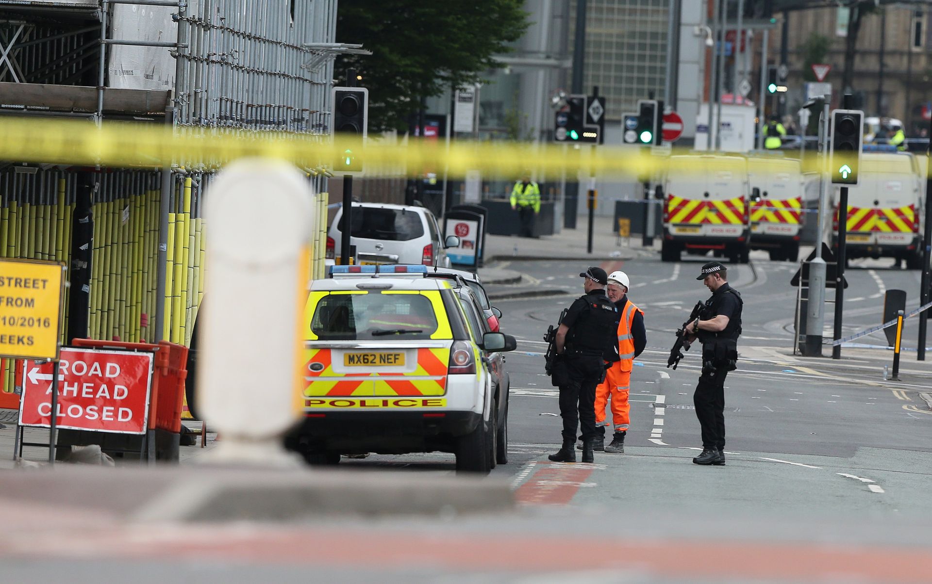 epa05982797 Armed police patrol the Manchester Arena in Manchester, Britain, 23 May 2017. According to a statement by the Greater Manchester Police, at least 22 people have been confirmed dead and around 59 others were injured, in an explosion at the Manchester Arena on the night of 22 May at the end of a concert by US singer Ariana Grande. Police believe that the explosion, which is being treated as a terrorist incident, was carried out by a single man using an improvised explosive device (IED), who was confirmed dead at the scene.  EPA/NIGEL RODDIS