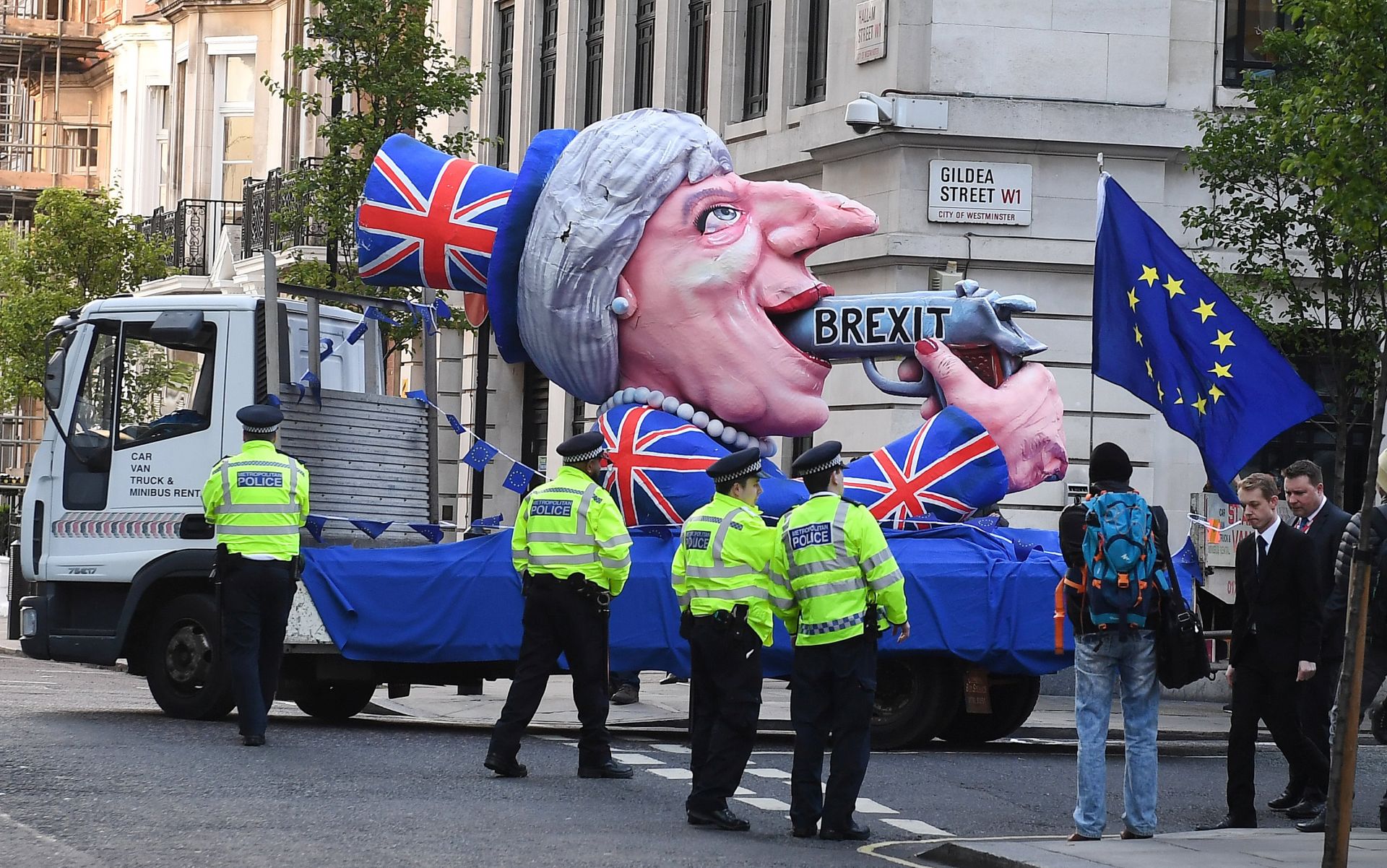 epa05953303 Pro EU protesters demonstrate with a float against the visit of British Prime Minister Theresa May to the BBC building, where she will take part in the 'One Show', in London, Britain, 09 May 2017. British Prime Minister Theresa May has announced a snap general election for 08 June.  EPA/ANDY RAIN