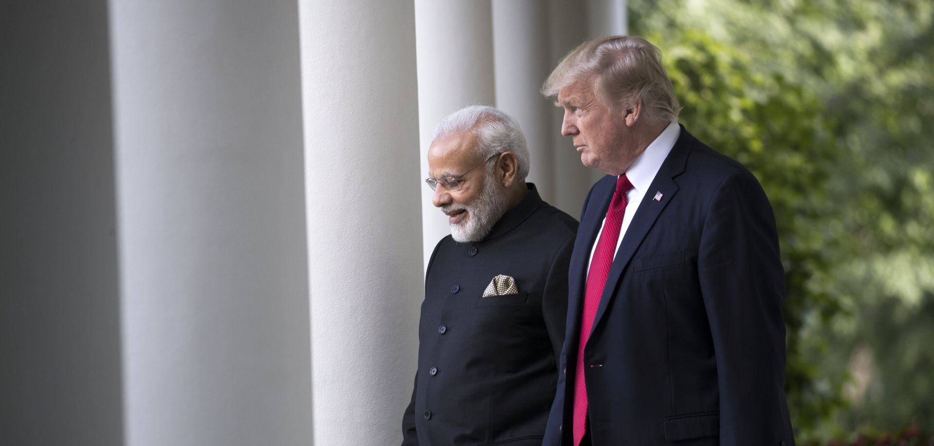epaselect epa06051874 US President Donald J. Trump (R) and Indian Prime Minister Narendra Modi (L) walk from the Oval Office to deliver remarks during a ceremony in the Rose Garden of the White House in Washington, DC, USA, 26 June 2017.  EPA/SHAWN THEW