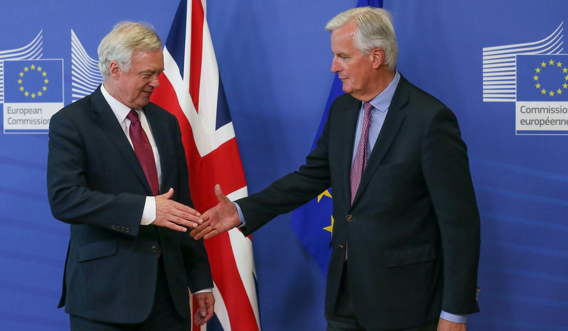 epa06036798 United Kingdom Secretary of State for Exiting the European Union, David Davis (L) is  welcome by Michel Barnier, the European Chief Negotiator of the Task Force for the Preparation and Conduct of the Negotiations with the United Kingdom under Article 50, dubbed the 'Brexit' ahead of a meeting at EU Commission in Brussels, Belgium, 19 June 2017. The first stage of the negotiations concerns the fate of European expatriates in the United Kingdom and Britons settled in Europe, the question of the Irish border and the 'financial regulation' between the United Kingdom and Europe.  EPA/STEPHANIE LECOCQ