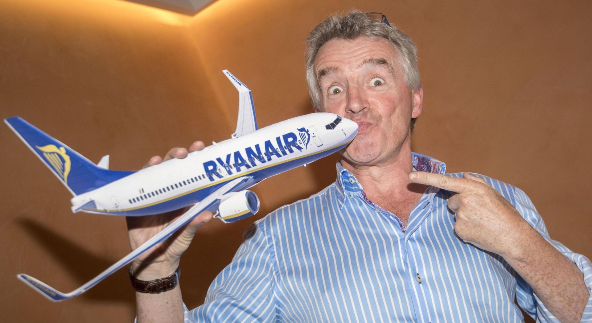 epa06052708 Ryanair's CEO, Michael O'Leary, poses for photographers prior to the start of a press conference in Rome, Italy, 27 June 2017. Michael O'Leary said 'We are pleased to announce record bookings on our Italy summer 2017 schedule as even more customers travel to/from our 26 Italian airports on the lowest fares, with over 400 routes to choose from. Our Italian traffic will grow by over 12 per cent this year from 32m to 36m customers. We are pleased to roll out our latest customer improvements under Year 4 of our 'Always Getting Better' programme, including connecting flights through Rome Fiumicino and Milan Bergamo, long haul Air Europa flights on sale on the Ryanair.com website, a new partnership with the Erasmus Student Network and an enhanced Ryanair Rooms website  with much more to come.  EPA/CLAUDIO PERI