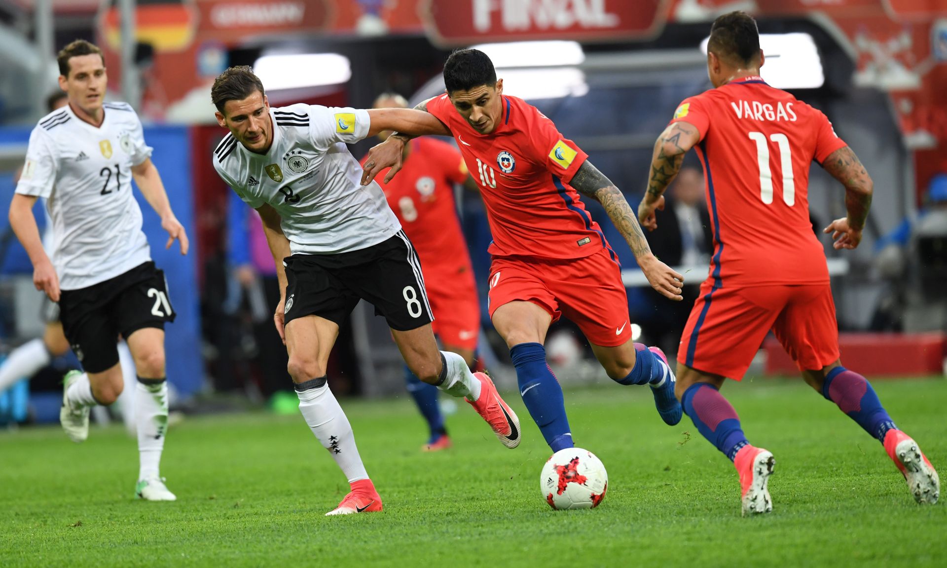 epa06062227 Chile's Pablo Hernandez (2-R) in action against Germany's Leon Goretzka (2-L) during the FIFA Confederations Cup 2017 final match between Chile and Germany at the Saint Petersburg stadium in St.Petersburg, Russia, 02 July 2017.  EPA/GEORGI LICOVSKI