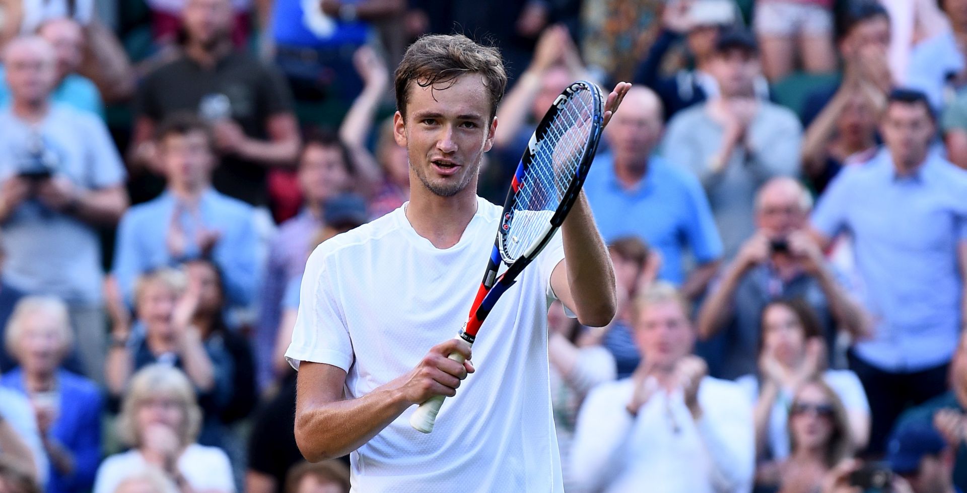 epa06064164 Daniil Medvedev of Russia celebrates winning against Stan Wawrinka of Switzerland during their first round match for the Wimbledon Championships at the All England Lawn Tennis Club, in London, Britain, 03 July 2017.  EPA/GERRY PENNY EDITORIAL USE ONLY/NO COMMERCIAL SALES