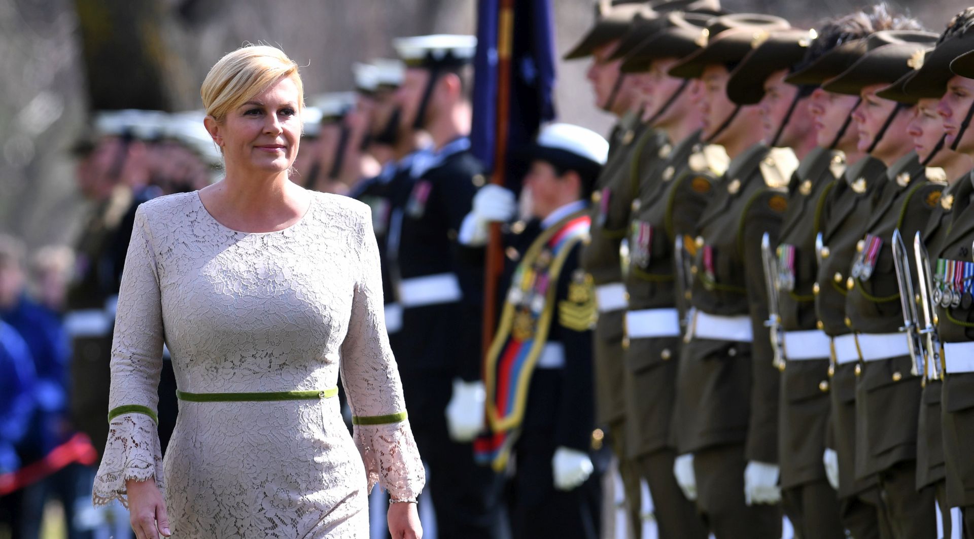 epa06144935 President of Croatia Kolinda Grabar-Kitarovic inspects the guard of honour during a ceremonial welcome at the Government House in Canberra, Australia, 15 August 2017. Grabar-Kitarovic is on a state visit to Australia and New Zealand, the first Croatian president to do so in 22 years.  EPA/LUKAS COCH  AUSTRALIA AND NEW ZEALAND OUT
