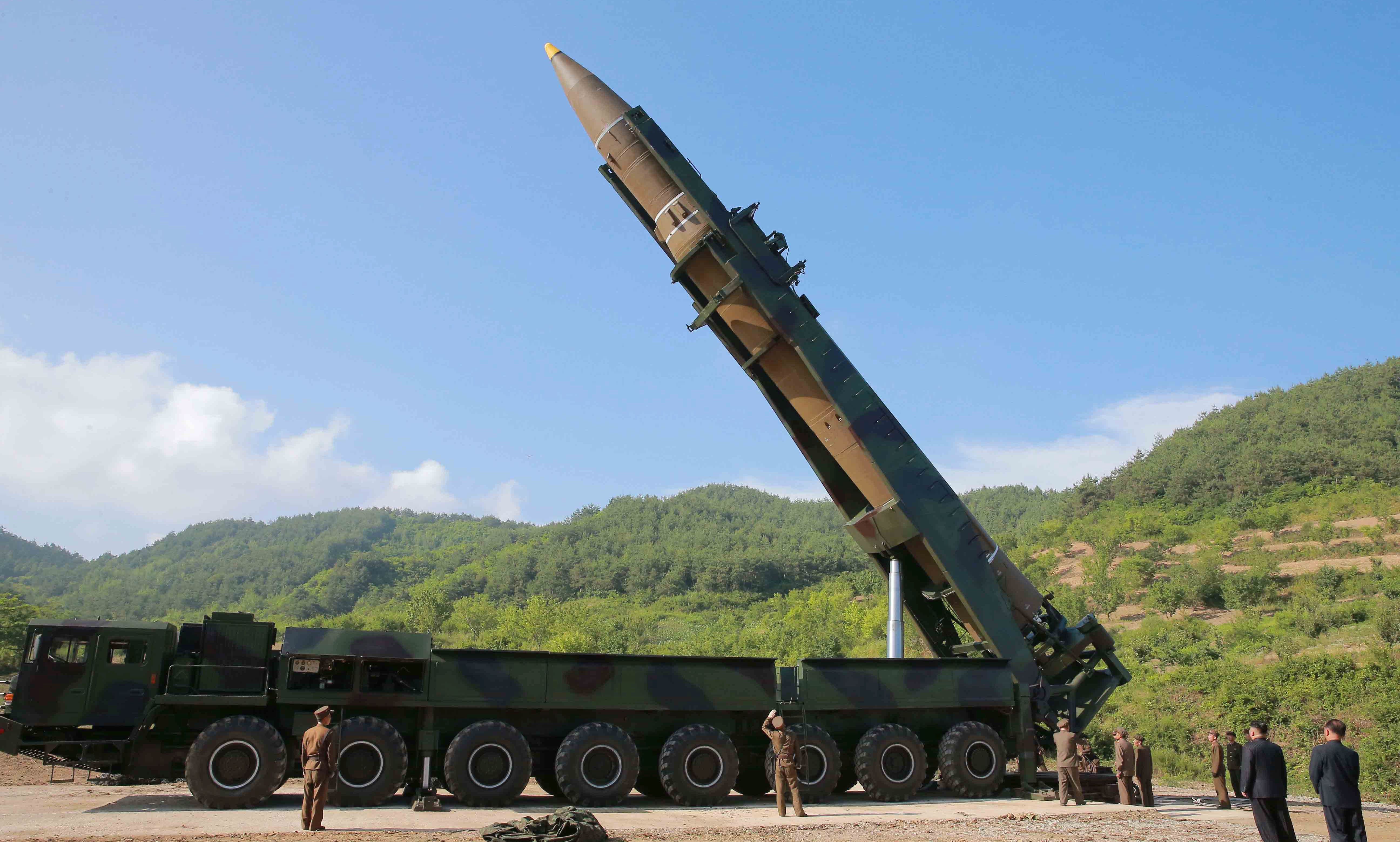epa06169199 (FILE) - A photo made available by the North Korean Central News Agency (KCNA), the state news agency of North Korea, shows  the North Korean inter-continental ballistic rocket Hwasong-14 being prepared before a test launch at an undisclosed location in North Korea, 04 July 2017. Media reports on 28 August 2017 state that North Korea has launched a missile and the Japanese Government warns it is headed towards northern Japan.  EPA/KCNA