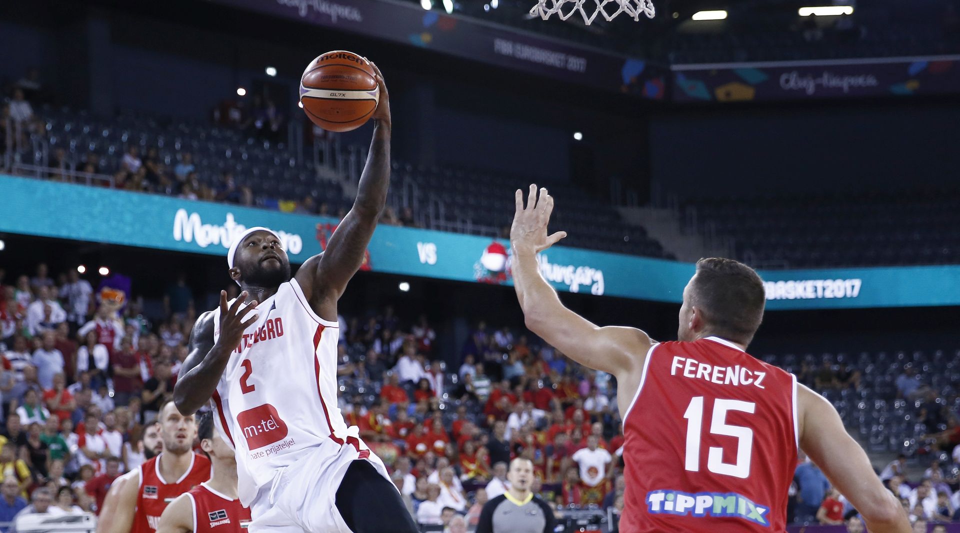 epa06178944 Montenegro's Tyrese Rice (L) in action with Hungary's Csaba Ferencz (R) during the EuroBasket 2017 group C match between Montenegro and Hungary, in Cluj Napoca, Romania, 02 September 2017.  EPA/ROBERT GHEMENT