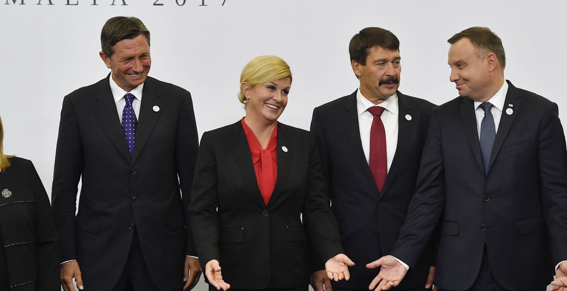 epa06204383 (L-R) Presidents Borut Pahor of Slovenia, Kolinda Grabar-Kitarovic of Croatia, Janos Ader of Hungary and Andrzej Duda of Poland  chat as they pose for the family photo, during the two-day presidential summit of Arraiolos Group in the Grandmaster's Palace in Valletta, Malta, 14 September 2017. Malta is hosting the 13th Meeting of the Heads of State of the Arraiolos Group between the 14 and 15 September 2017.  EPA/TIBOR ILLYES HUNGARY OUT