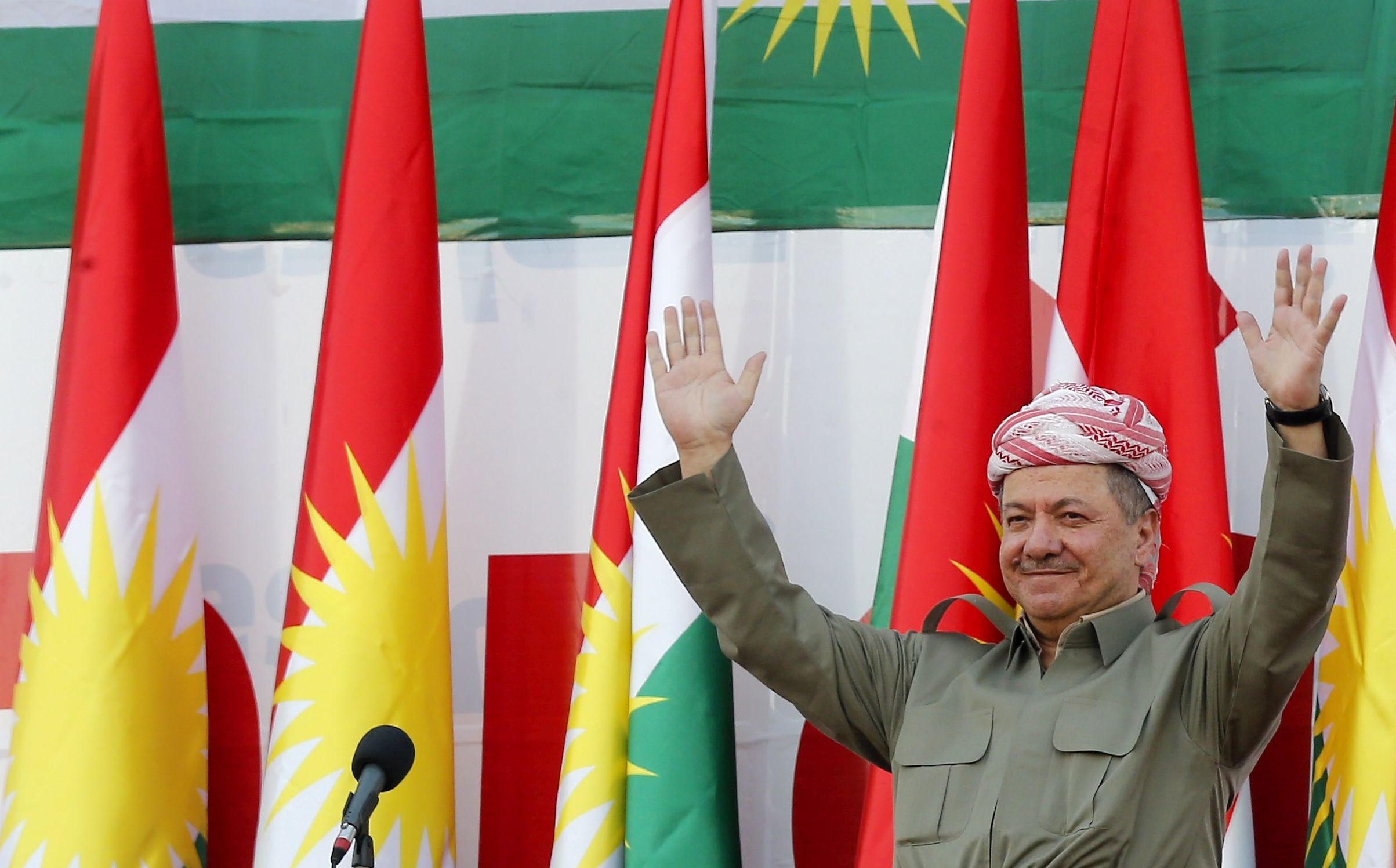 epa06220221 Iraq's Kurdistan region's President Massoud Barzani take part in a rally for the Kurdistan independence referendum campaign at the Franso Hariri stadium in Erbil, Iraq, 22 September 2017. The Kurdistan region is an autonomous region in northern Iraq since 1991, with an estimated population of 5.3 million people. The region share borders with Turkey, Iran, and Syria, all of which have large Kurdish minorities. On 25 September the Kurdistan region holds a referendum for independence and the creation of the state of Kurdistan amidst divided international support.  EPA/MOHAMED MESSARA