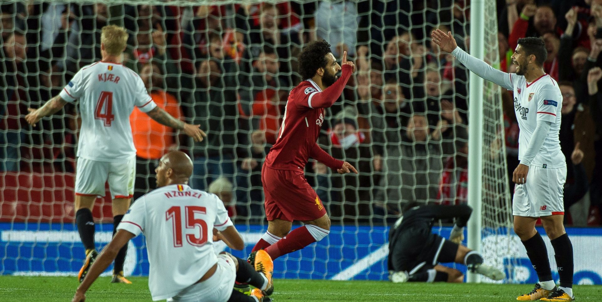 epa06202931 Liverpoolâ€™s Mohamed Salah (C) celebrates scoring during the UEFA Champions League Group E match between FC Liverpool and Sevilla FC held at Anfield, Liverpool, Britain, 13 September 2017.  EPA/Peter Powell