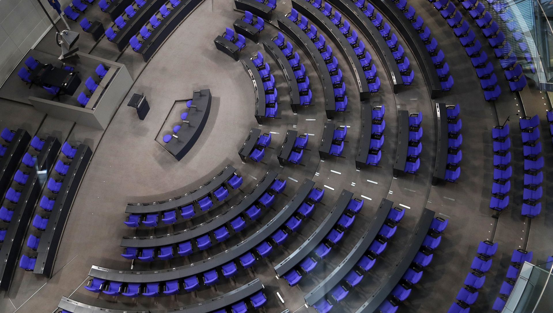 epa06228160 General view of the main hall with empty parliamentary seats in the German parliament Bundestag in Berlin, Germany, 26 September 2017. Seven parties have won seats for the upcoming legislative period in the German lower house, the Bundestag. It is the highest number of parties represented in the Bundestag ever. Federal elections were held on 24 September 2017.  EPA/FELIPE TRUEBA