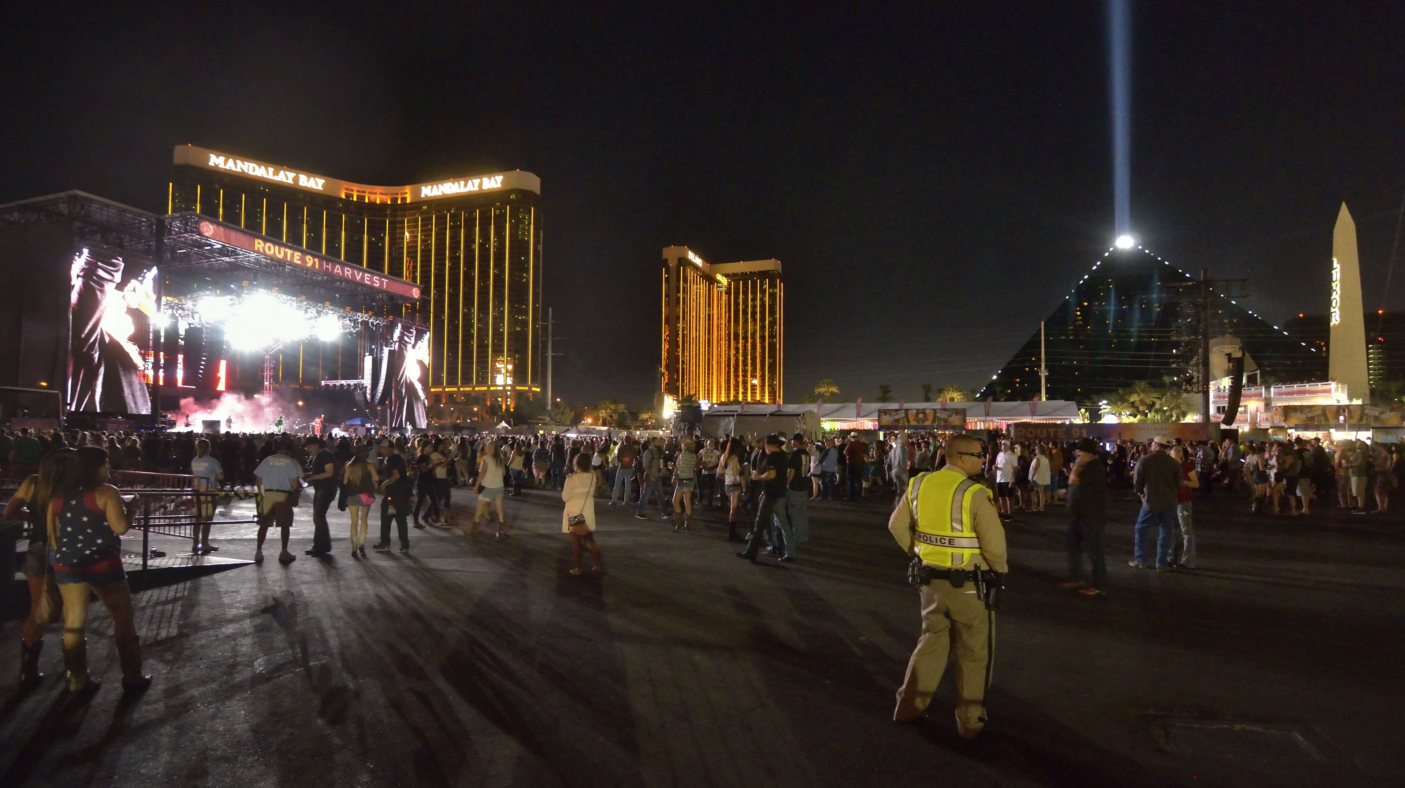 epa06239553 A handout photo made available by the Las Vegas News Bureau on 02 October showing the scene at the Route 91 Harvest festival on Las Vegas Boulevard South in Las Vegas 30 September, 2017. Reports indicate that late at night on 01 October during the second night of the festival that a gunman opened fire from the Mandalay Bay hotel (L) into crowds at the festival.  EPA/Bill Hughes/Las Vegas News Bureau/ HANDOUT MANDATORY CREDIT, HANDOUT EDITORIAL USE ONLY/NO SALES/NO ARCHIVES