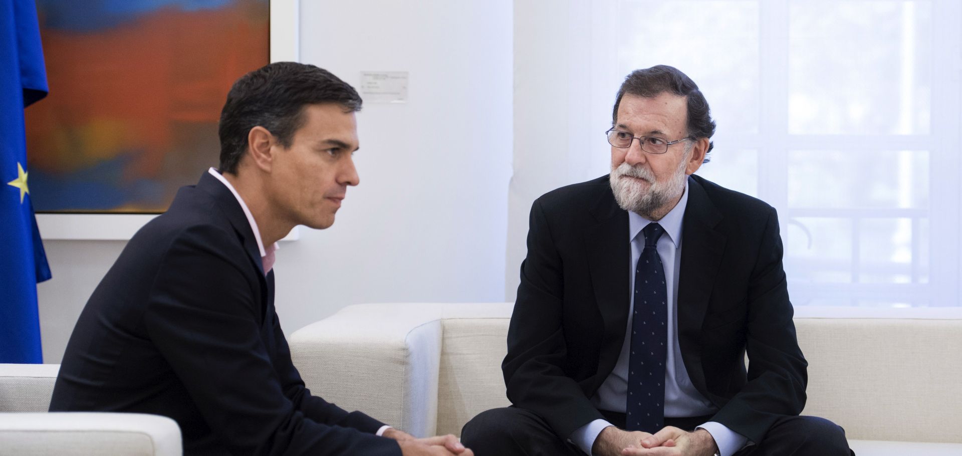 epa06240207 Spanish Prime Minister Mariano Rajoy (R) talks with PSOE party leader Pedro Sanchez (L), during their meeting on the '1-O Referendum' held the previous day, at La Moncloa Palace, in Madrid, Spain, 02 October 2017. Catalan President Puigdemont has asked for an 'international mediation' to deal with the current situation in Catalonia and claimed for the 'withdrawal of the police forces' deployed in the region. Catalonia held on 01 October an independence referendum, that was celebrated in spite of it had been banned by the Constitutional Court, ending with clashes between police and pro-independence people. A day after of the illegal referendum, a high tension atmosphere is present between the Catalan Government and the Spanish central Government with an open door to a possible unilateral declaration of independence by the Catalan Government.  EPA/LUCA PIERGIOVANNI