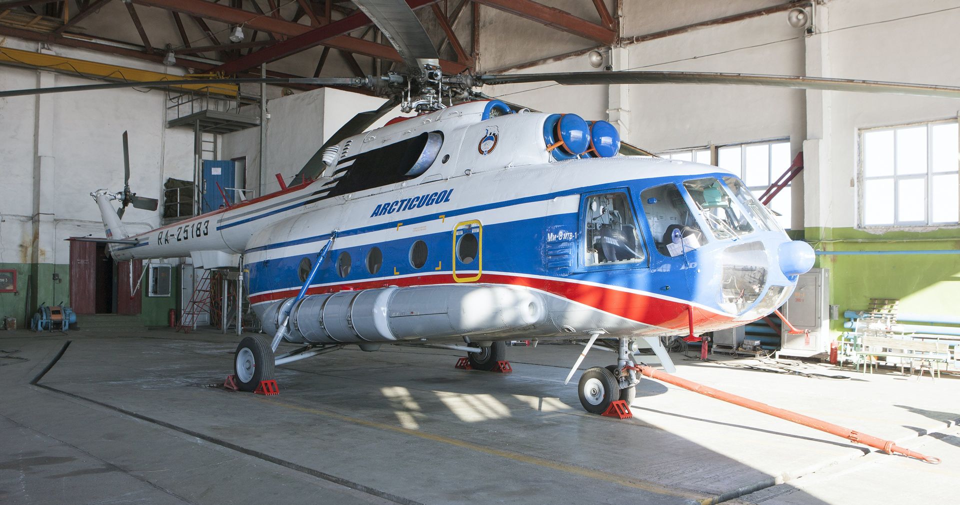 epa06291056 (FILE) - A Russian helicopter in a hanger  at it's base, Kapp Heer at Barentsburg, Norway, 05 May 2011. Reports state that a Russian helicopter with eight people aboard has crashed in the sea outside Barentsburg at Svalbard, Spitsbergen,  and the Norway Rescue Service then confirmed the helicopter 'came down' just 2km off the coast of Barentsburg.  EPA/Birger Amundsen NORWAY OUT NORWAY OUT