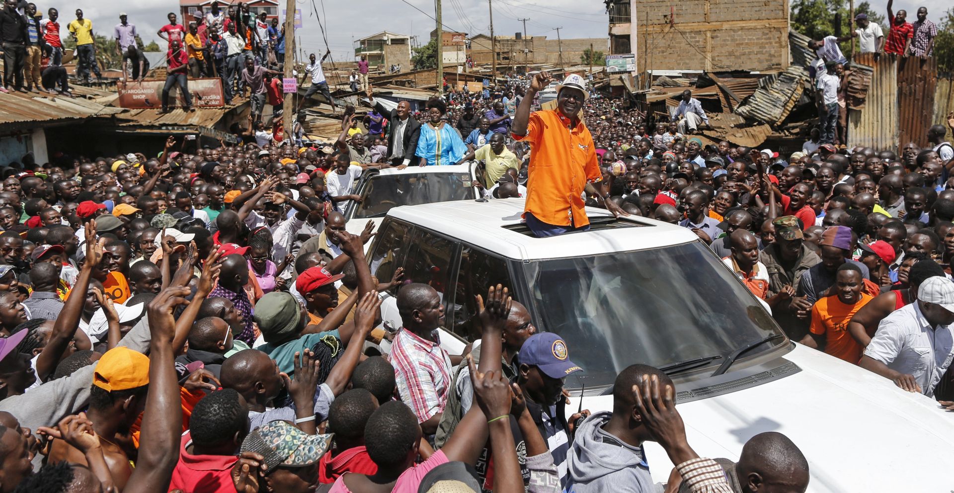 epa06296563 The leader of the opposition coalition the National Super Alliance (NASA) and its presidential candidate Raila Odinga speaks to thousands of cheering supporters in Kawangware slum after attending a church service in Nairobi, Kenya, 29 October 2017. Odinga condemned recent violence against his supporters in Kawangware which saw days of violence and clash between rival ethinc groups. Kenya's election commission Independent Electoral and Boundaries Commission (IEBC) on 27 October called off repeat presidential poll in four counties indefinitely as the country awaits for the resut of the repeat poll.  EPA/DAI KUROKAWA