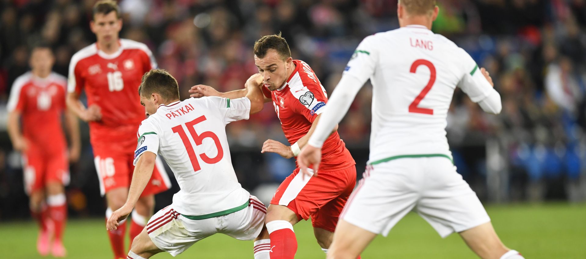 epa06251037 Switzerland's Xherdan Shaqiri (C) fights for the ball with Hungary's Mate Patkai (L) and Adam Lang during the 2018 FIFA World Cup Group B qualification soccer match between Switzerland and Hungary in the St. Jakob-Park stadium in Basel, Switzerland, 07 October 2017.  EPA/GIAN EHRENZELLER