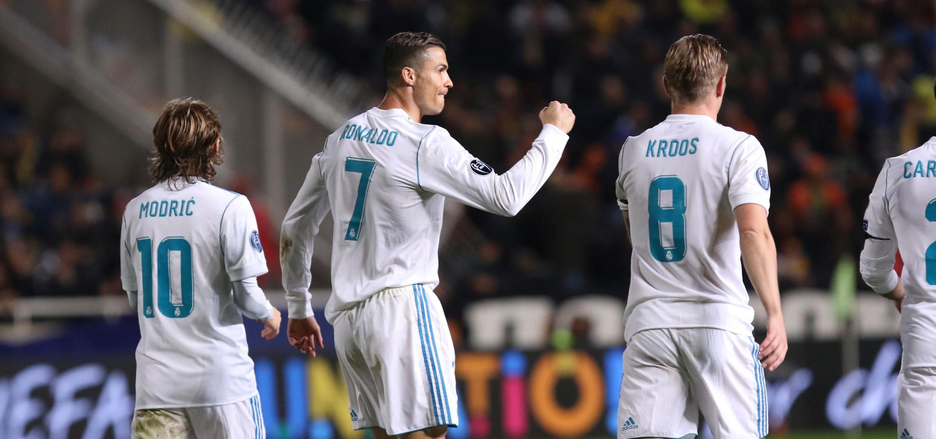 epa06342995 Real Madrid's player Cristiano Ronaldo (C), Luka Modric (L) and Toni Kroos celebrate a goal during the UEFA Champions League Group H match between Apoel FC and Real Madrid at the GSP stadium in Nicosia, Cyprus, 21 November 2017.  EPA/KATIA CHRISTODOULOU