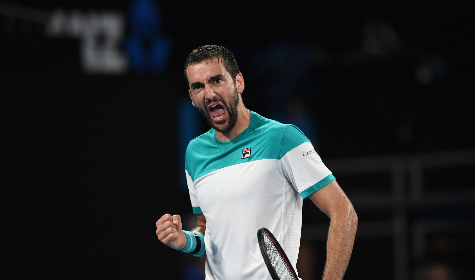 epa06453261 Marin Cilic of Croatia reacts during his third round match against Ryan Harrison of the United States at the Australian Open tennis tournament in Melbourne, Victoria, Australia, 19 January 2018.  EPA/JOE CASTRO  AUSTRALIA AND NEW ZEALAND OUT