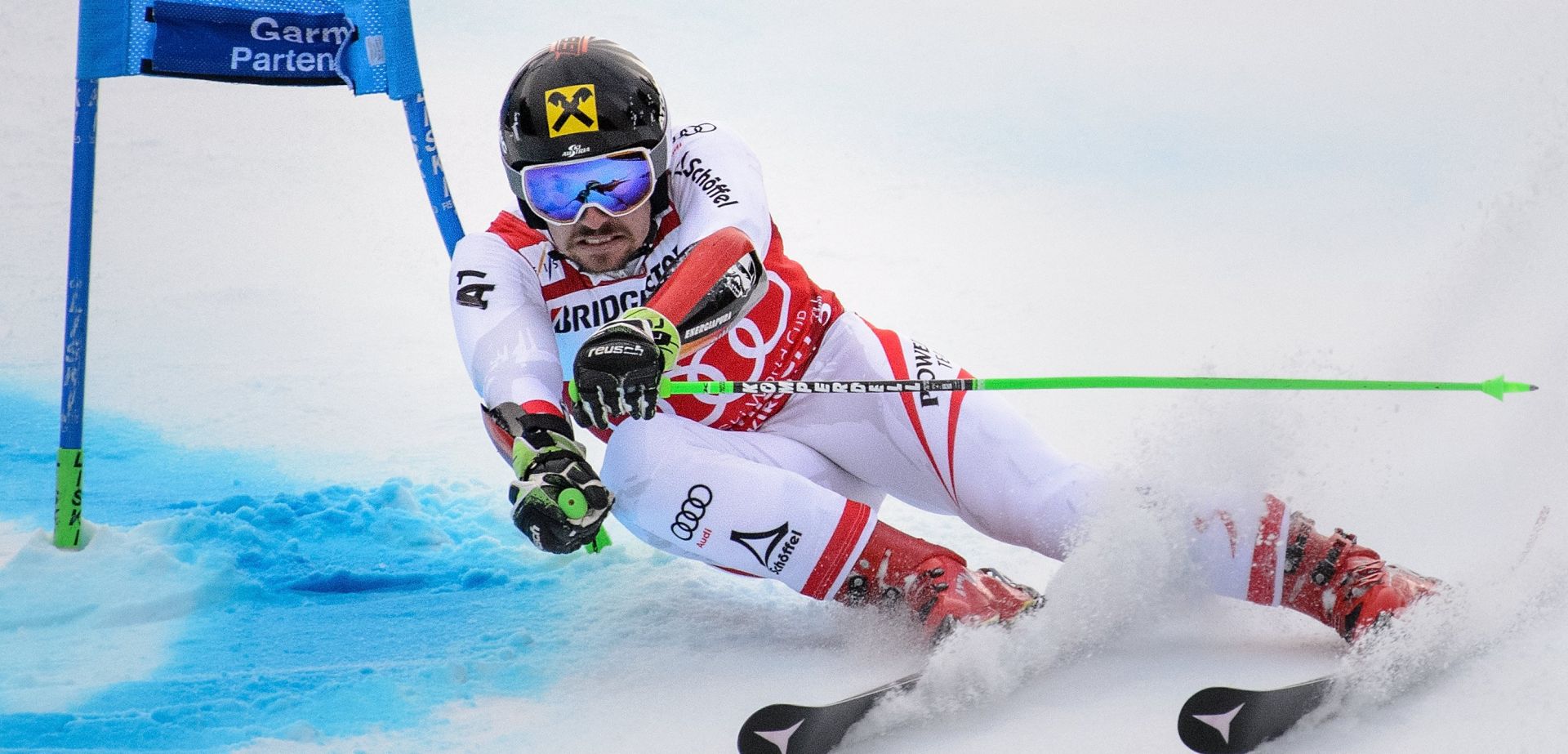 epa06480650 Marcel Hirscher of Austria speeds down the slope during the first run of the Men's Giant Slalom race of the FIS Alpine Skiing World Cup in Garmisch-Partenkirchen, Germany, 28 January 2018.  EPA/PHILIPP GUELLAND