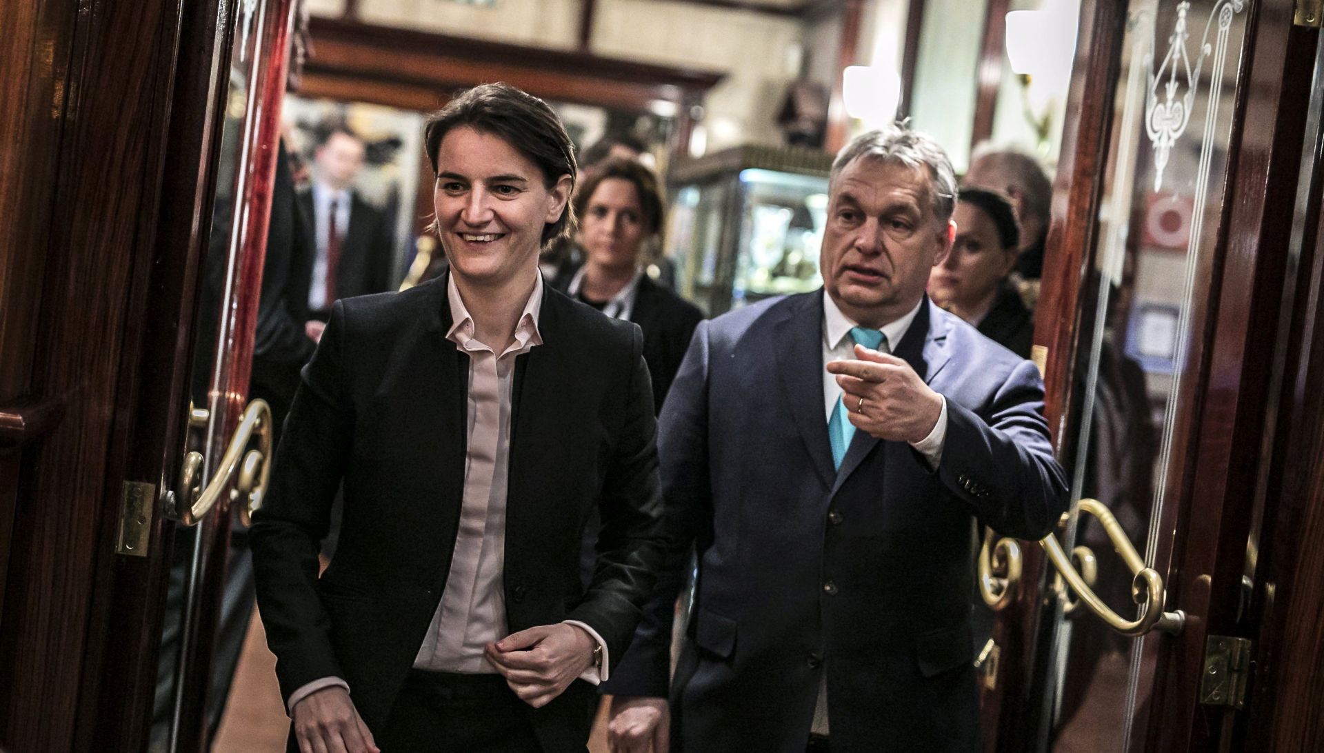 epa06506260 A handout photo made available by the Hungarian Prime Minister's Office shows Serbian Prime Minister Ana Brnabic (l) and her Hungarian counterpart Viktor Orban (R) as they arrive for a dinner at Restaurant Gundel in Budapest, Hungary, 08 February 2018. Brnabic and Orban will hold official talks on 09 February.  EPA/BALAZS SZECSODI / PRIME MINISTER'S OFFICE / HANDOUT HUNGARY OUT HANDOUT EDITORIAL USE ONLY/NO SALES