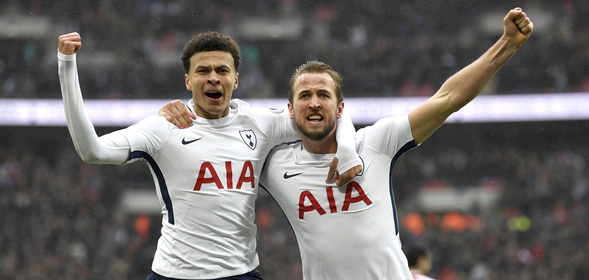 epa06511396 Tottenham Hotspur's Harry Kane (R) celebrates scoring a goal with teammate Dele Alli (L) during the English Premier League soccer match between Tottenham Hotspur and Arsenal at Wembley Stadium, London, Britain, 10 February 2018.  EPA/NEIL HALL EDITORIAL USE ONLY. No use with unauthorized audio, video, data, fixture lists, club/league logos or 'live' services. Online in-match use limited to 75 images, no video emulation. No use in betting, games or single club/league/player publications.