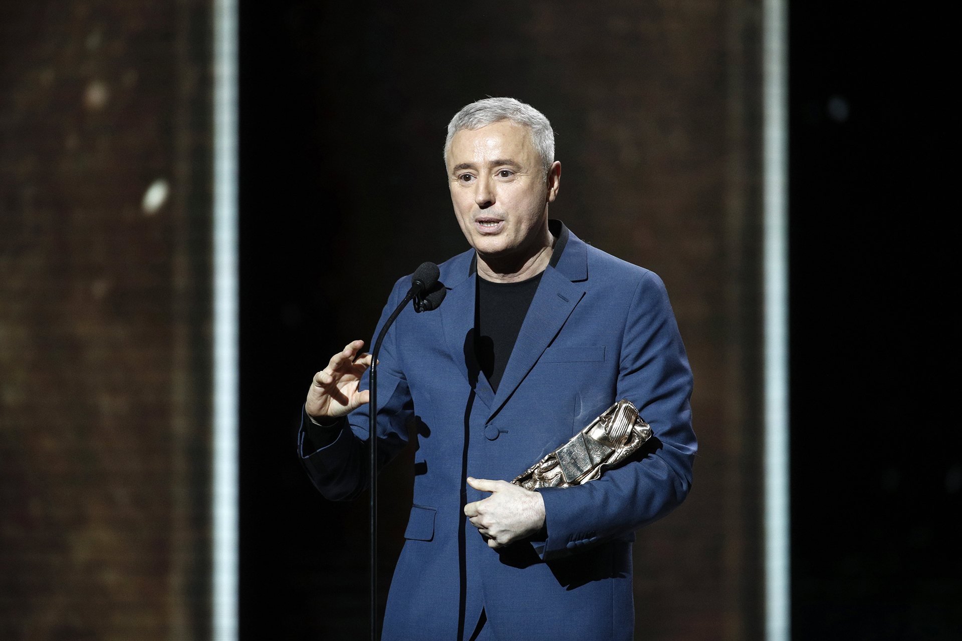 epa06575916 Robin Campillo receives the Best Originial Screenplay award for '120 Battements par minute' during the 43rd annual Cesar awards ceremony held at the Salle Pleyel concert hall in Paris, France, 02 March 2018.  EPA/YOAN VALAT