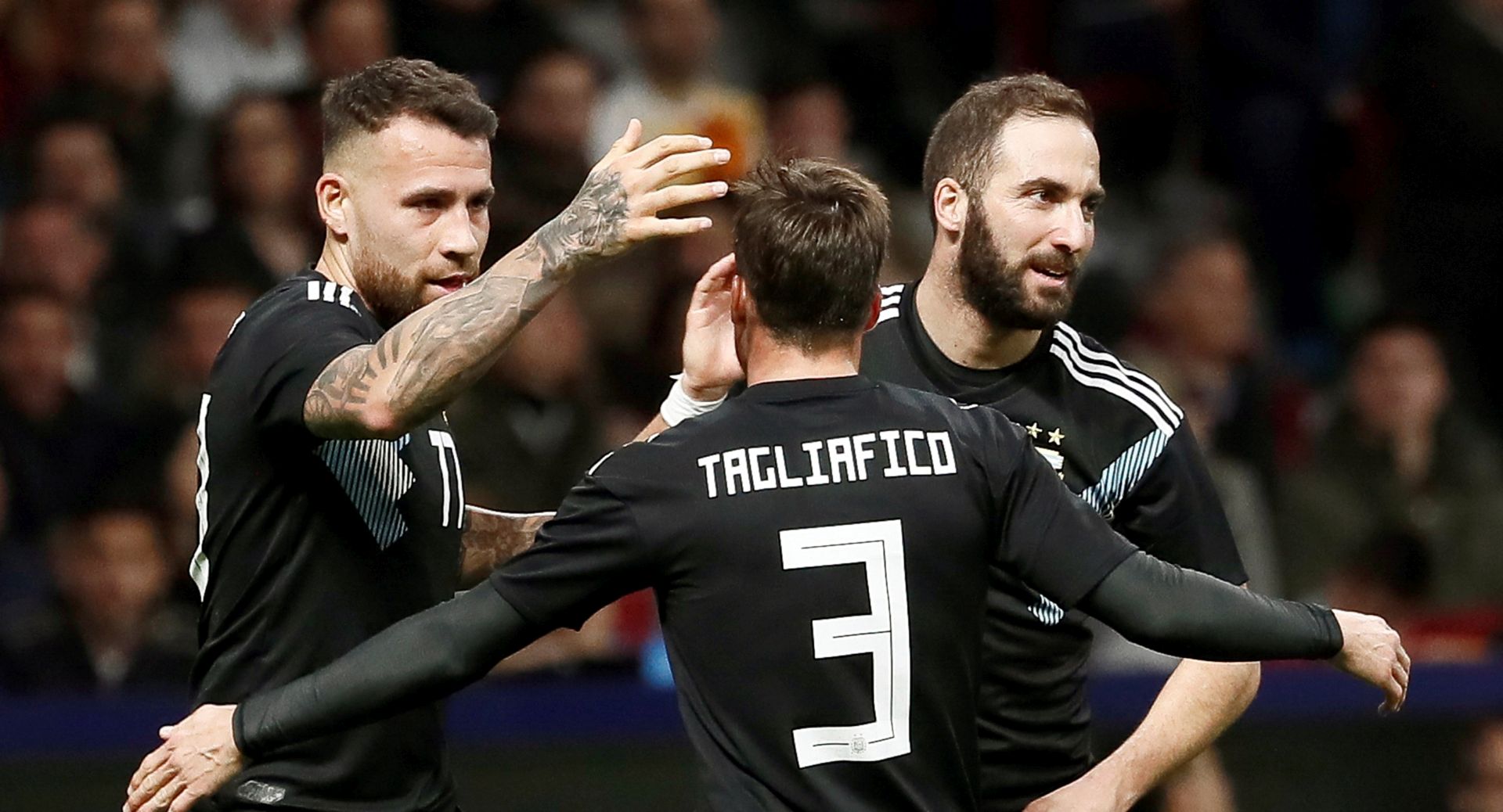 epa06633149 Argentina's Nicolas Otamendi (L) celebrates with teammates after scoring a goal during an international friendly soccer match between Argentina and Spain at Wanda Metropolitano stadium in Madrid, Spain, 27 March 2018.  EPA/MARISCAL