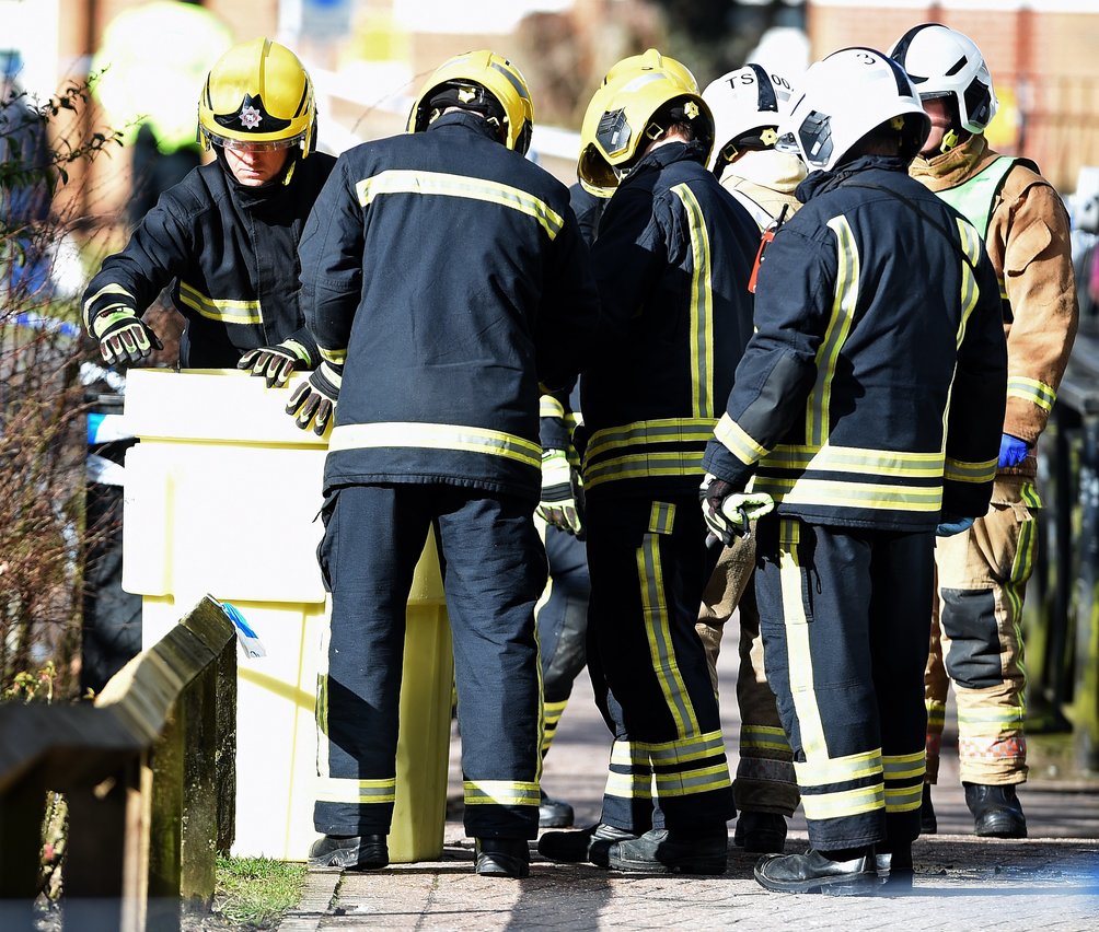 epa06589417 Firefighters are called to remove suspect objects from the nerve agent crime scene to a contamination bin in the Cathedral City of Salisbury, Wiltshire, southern England, 08 March 2018, next to where ex Russian spy Sergei Skripal aged 66 and his daughter Yulia aged 33 were found on a bench suffering from extreme exposure to a rare nerve agent on 04 March 2018. The London Metropolitan Police Service (MPS) reported on 07 March 2018 that Detectives investigating how former Russian spy Sergei and Yulia Skripal became seriously ill in Salisbury southern England on 04 March 2018 continue to work with specialist health experts. Police are now in a position to confirm that their symptoms are a result of exposure to a nerve agent. Scientific tests by Government experts have identified the specific nerve agent used which will help identify the source but at this stage in a fast-paced ongoing investigation we will not comment further. Assistant Commissioner Mark Rowley, the head of Counter Terrorism Policing, said: 'Having established that they were exposed to a nerve agent we are now treating this as a major incident involving an attempted murder by the administration of a nerve agent.'  EPA/GERRY PENNY