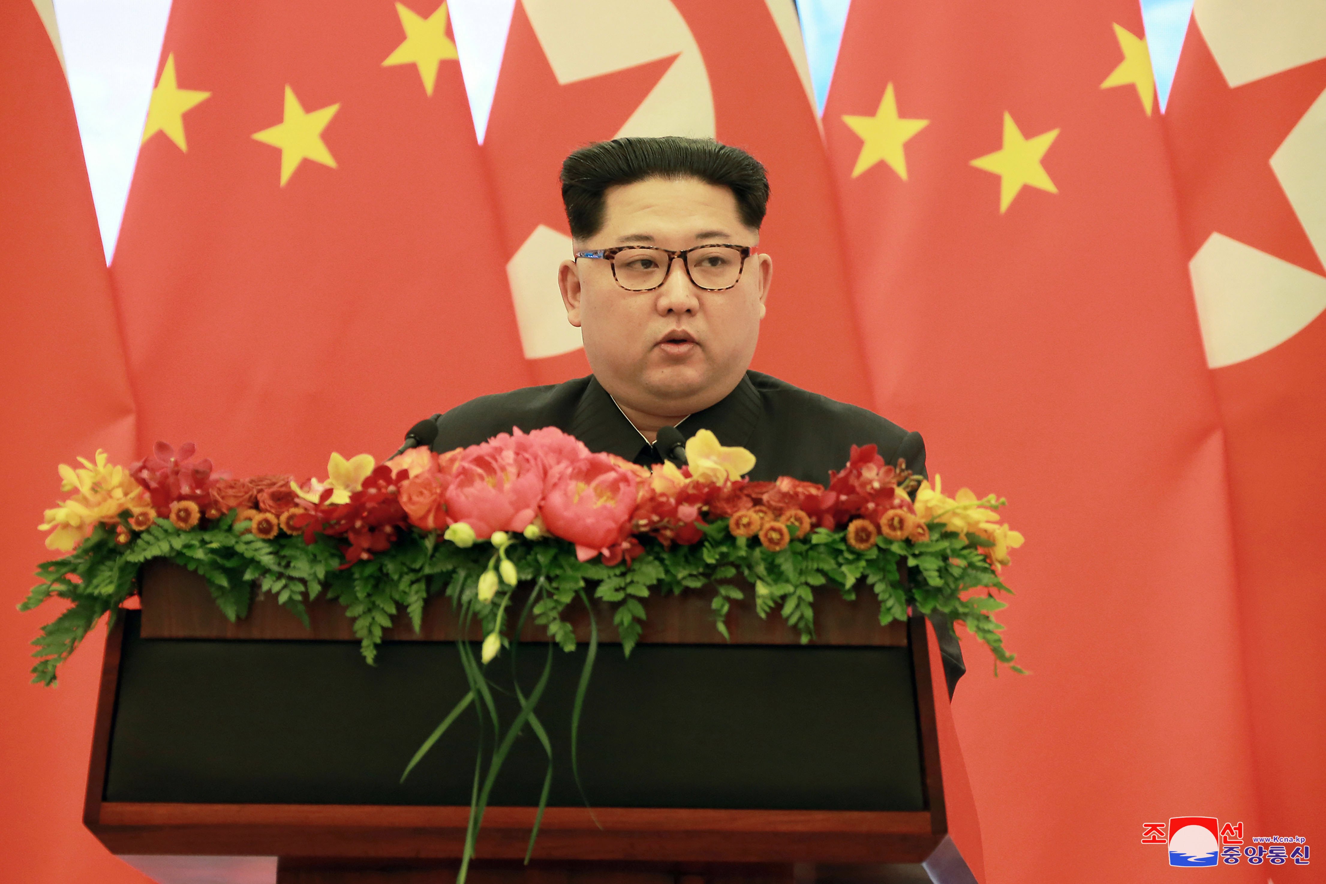 epa06633534 An undated photo released on 28 March 2018 by the North Korean Central News Agency (KCNA), the state news agency of North Korea, shows North Korean leader Kim Jong-un giving a speech during a visit to China. According to the North Korean media, Kim Jong-un visited China from 25 to 28 March at the invitation of Chinese President Xi Jinping.  EPA/KCNA   EDITORIAL USE ONLY
