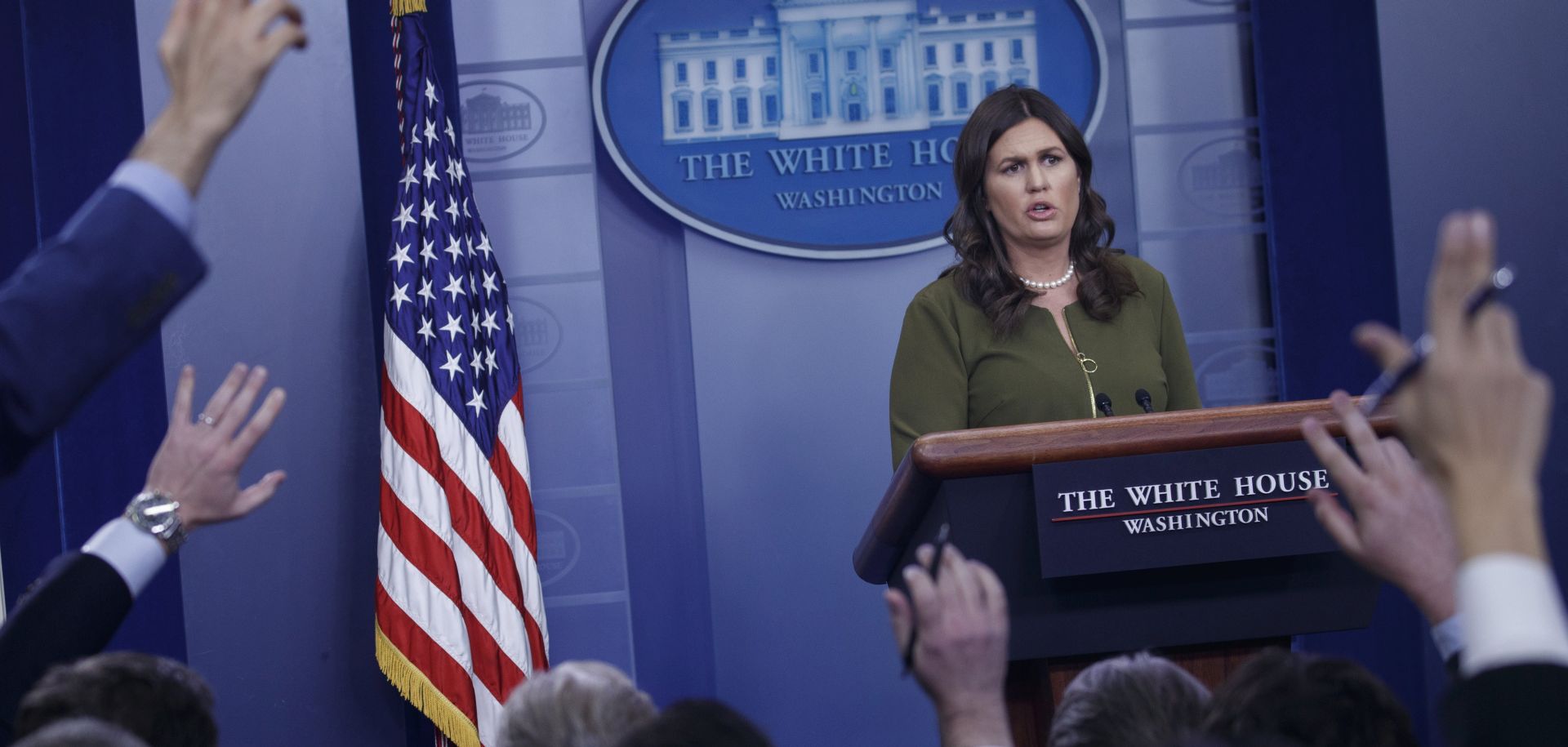 epa06650916 White House Press Secretary Sarah Huckabee Sanders responds to a question from the news media during the daily briefing at the White House in Washington, DC, USA 06 April 2018. Sanders announced a private dinner at Mt. Vernon with French President Emmanuel Macron as well as fielded questions on trade and Amazon.  EPA/SHAWN THEW