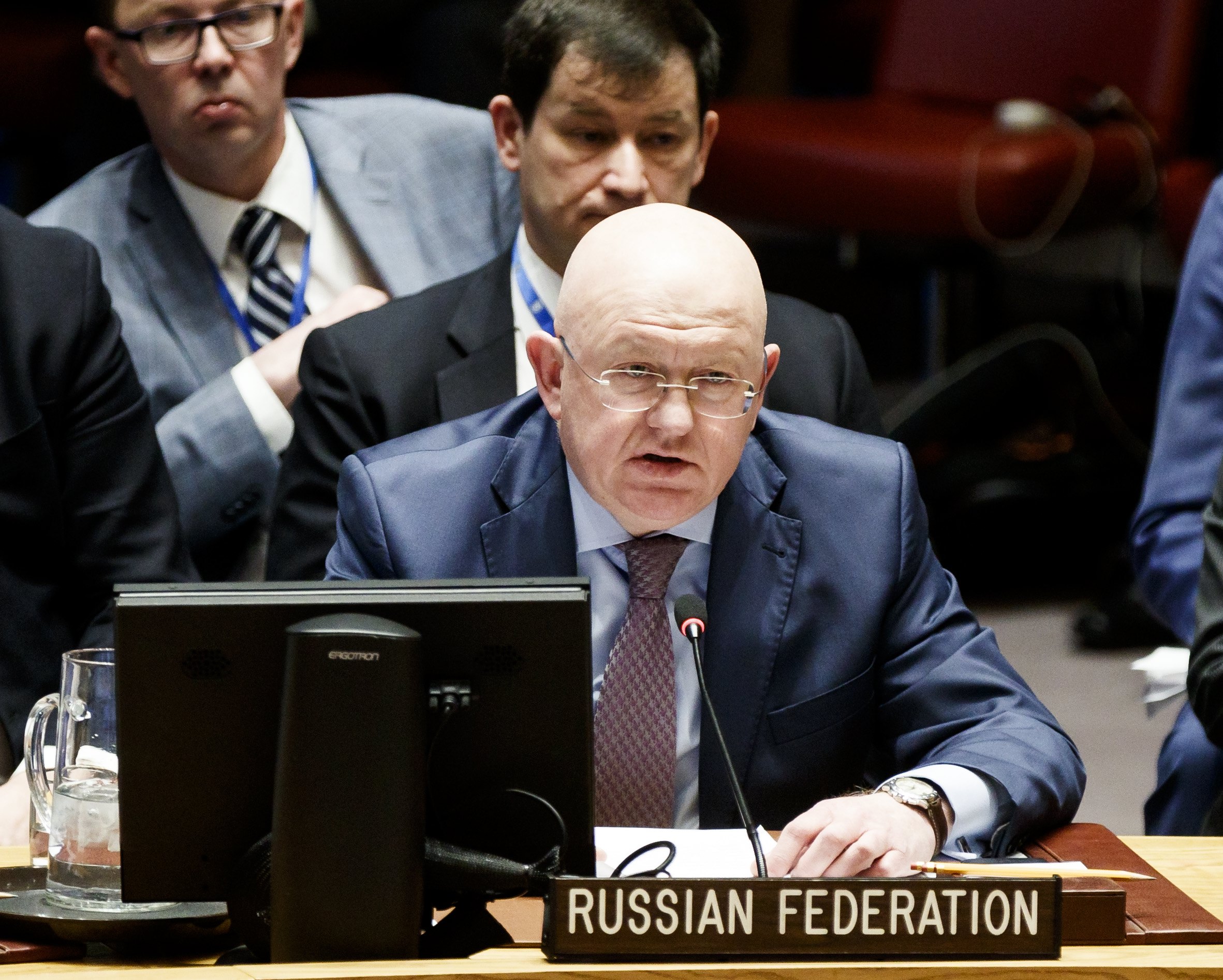 epa06657868 Vassily Nebenzia (C), Russia's Permanent Representative to the United Nations, addresses an emergency United Nations Security Council meeting in response to a suspected chemical weapons attack in Syria at United Nations headquarters in New York, New York, USA, 09 April 2018. The suspected chemical attack took place over weekend in the Damascus suburb of Douma, killing at least 49 people.  EPA/JUSTIN LANE