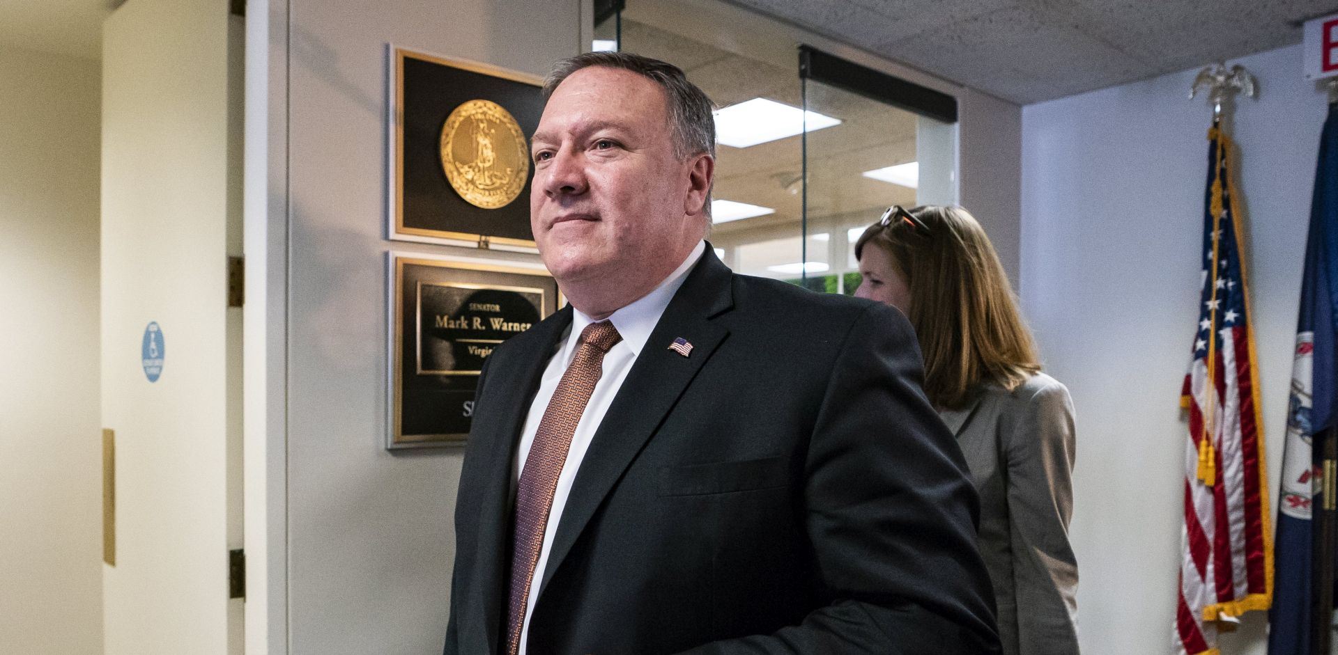 epa06677788 CIA Director Mike Pompeo leaves a meeting with Democratic Senator from Virginia Mark Warner (out of frame) in the Hart Senate Office Building in Washington DC, USA, 18 April 2018. Two weeks ago, Pompeo met secretly with North Korean leader Kim Jong Un in North Korea.  EPA/JIM LO SCALZO