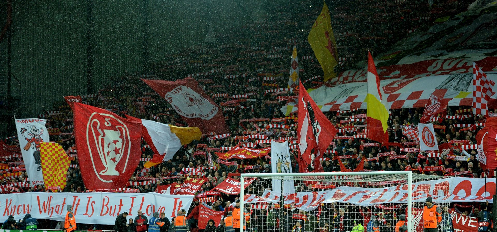 epa06690426 Liverpoolâ€™s fans raise flags and scarves during the UEFA Champions League semi final, first leg soccer match between Liverpool FC and AS Roma at Anfield, Liverpool, Britain, 24 April 2018.  EPA/PETER POWELL