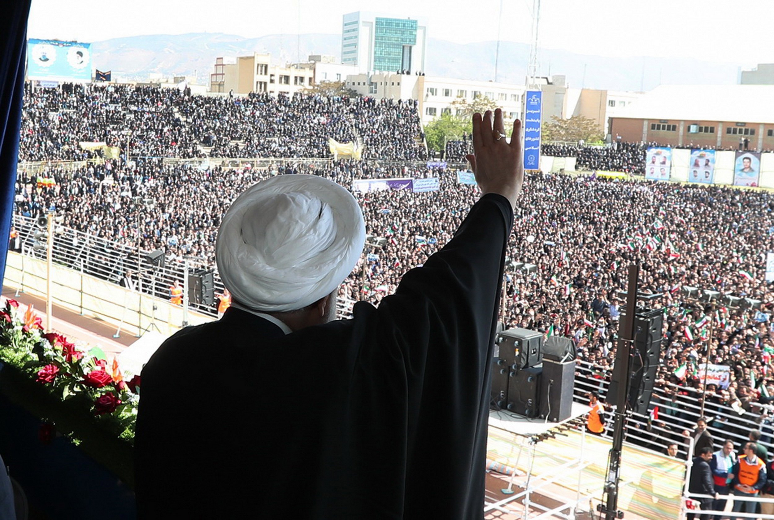 epa06689163 A handout photo made available by the presidential official website shows Iranian President Hassan Rouhani greeting the crowds in the City of Tabriz, northwestern, Iran, 24 April 2018. According to reports, Rouhani on 24 April warned his United States counterpart that abandoning a nuclear deal that the Tehran government signed with world powers in 2015 would lead to serious consequences. French President Emmanuel Macron was in Washington and is set to try and persuade US President Donald Trump not to walk away from the accord.  EPA/PRESIDENTIAL OFFICE HANDOUT  HANDOUT EDITORIAL USE ONLY/NO SALES