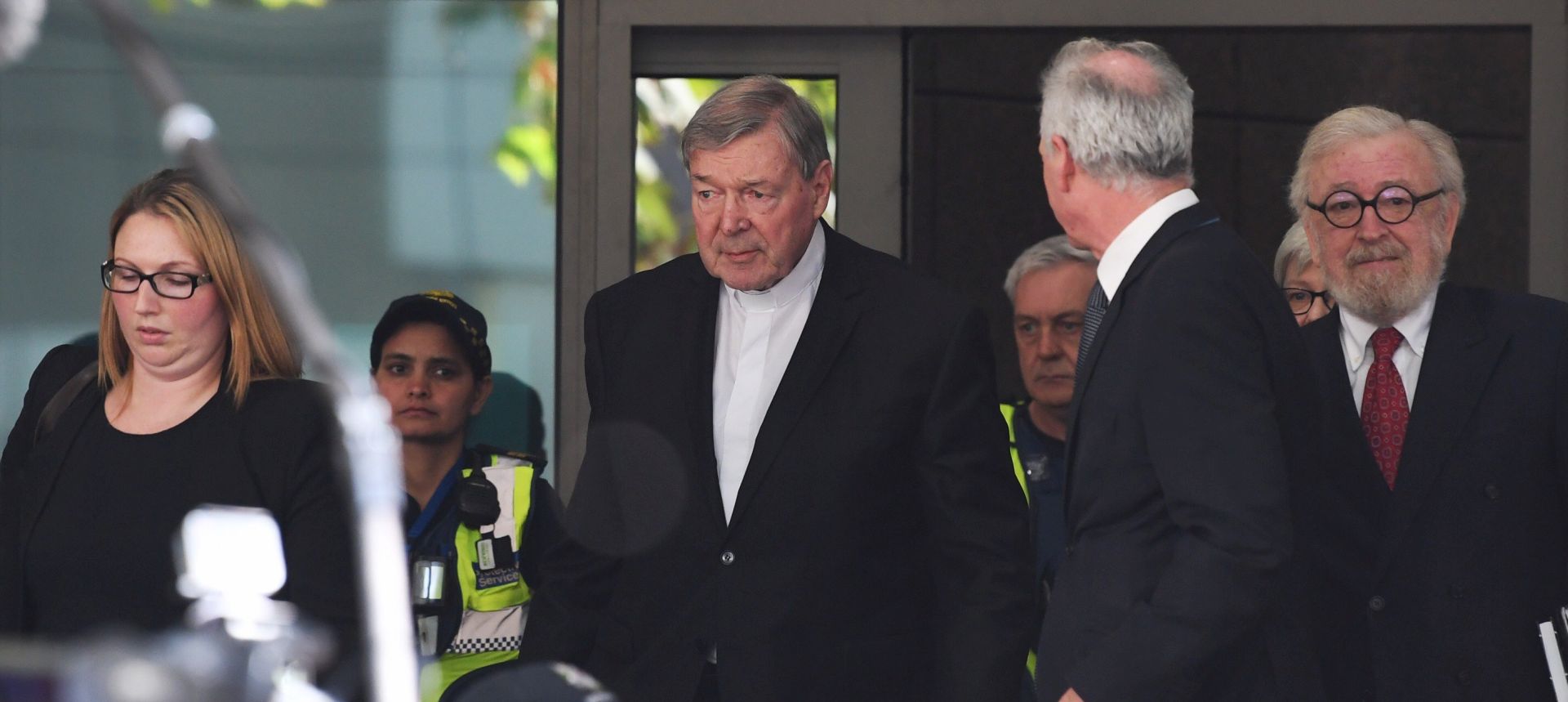 epa06703364 Australia's most senior Catholic Cardinal George Pell (C) leaves the Melbourne Magistrates Court in Melbourne, Australia, 01 May 2018. Cardinal Pell will stand trial on multiple historical sexual assault allegations, but other charges levelled against him have been discharged his committal on 01 May 2018.  EPA/JOE CASTRO NO ARCHIVING AUSTRALIA AND NEW ZEALAND OUT