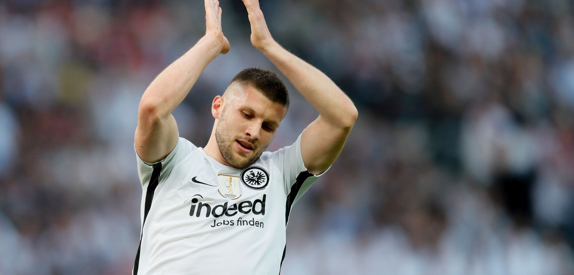 epa06750775 Frankfurt's Ante Rebic reacts during the German DFB Cup final soccer match between FC Bayern Munich and Eintracht Frankfurt at the Olympic Stadium in Berlin, Germany, 19 May 2018. (ATTENTION: The DFB prohibits the utilisation and publication of sequential pictures on the internet and other online media during the match (including half-time). ATTENTION: BLOCKING PERIOD! The DFB permits the further utilisation and publication of the pictures for mobile services (especially MMS) and for DVB-H and DMB only after the end of the match.)  EPA/RONALD WITTEK
