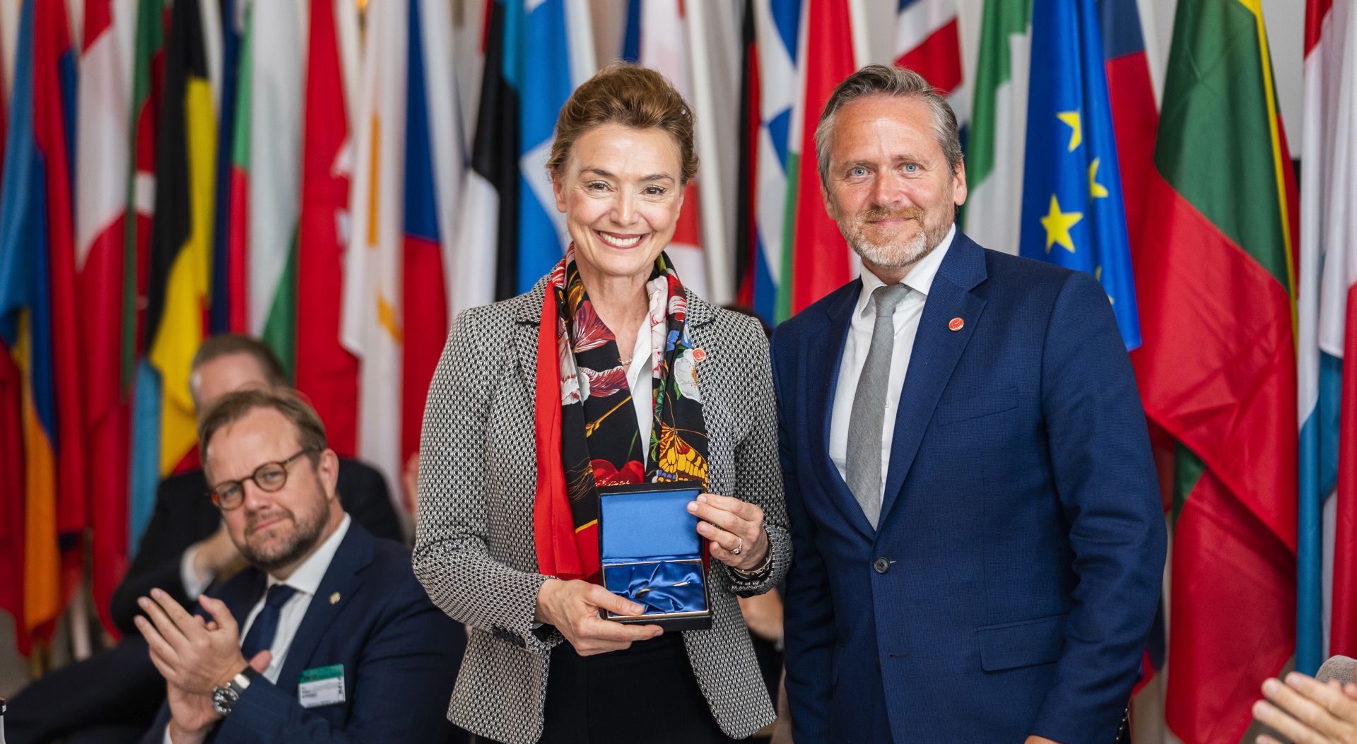 epa06747264 Danish Foreign Minister Anders Samuelsen (R) hands over the insignia of the regular changing presidency to Croatia's Foreign Minister Marija Pejcinovic Buric (C) at the end of the Council of Europe Committee of Ministers Annual Session, in Elsingoer, Denmark, 18 May 2018. The meeting of the 47 member states' Foreign Ministers was aimed at discussing topics such as 'the state of democracy, human rights and the rule of law in Europe, conflicts and crises in Europe, securing the long-term effectiveness of the system of the European Convention on Human Rights and co-operation with the European Union', according to a Council of Europe's media information. Others are not identified.  EPA/MARTIN SYLVEST DENMARK OUT
