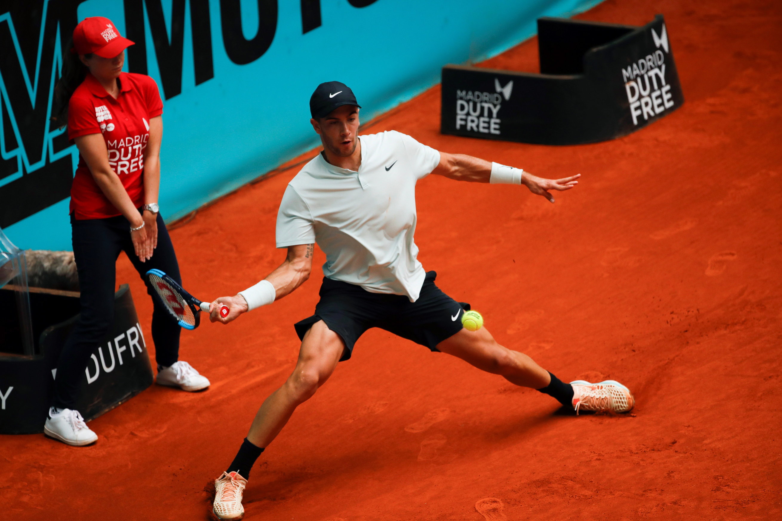 epa06719348 Croatia's Borna Coric in action during his men's singles first round match against Spanish player Pablo Carreno at the 2018 Mutua Madrid Open tennis tournament in Madrid, Spain, 08 May 2018.  EPA/JUANJO MARTIN