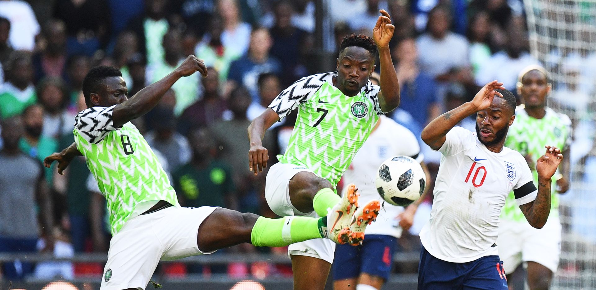 epa06781071 England's Raheem Sterling (R) in action against Nigerian players Ahmed Musa (C) and Oghenekaro Etebo (L) during the International Friendly soccer match between England and Nigeria at Wembley in London, Britain, 02 June 2018.  EPA/FACUNDO ARRIZABALAGA