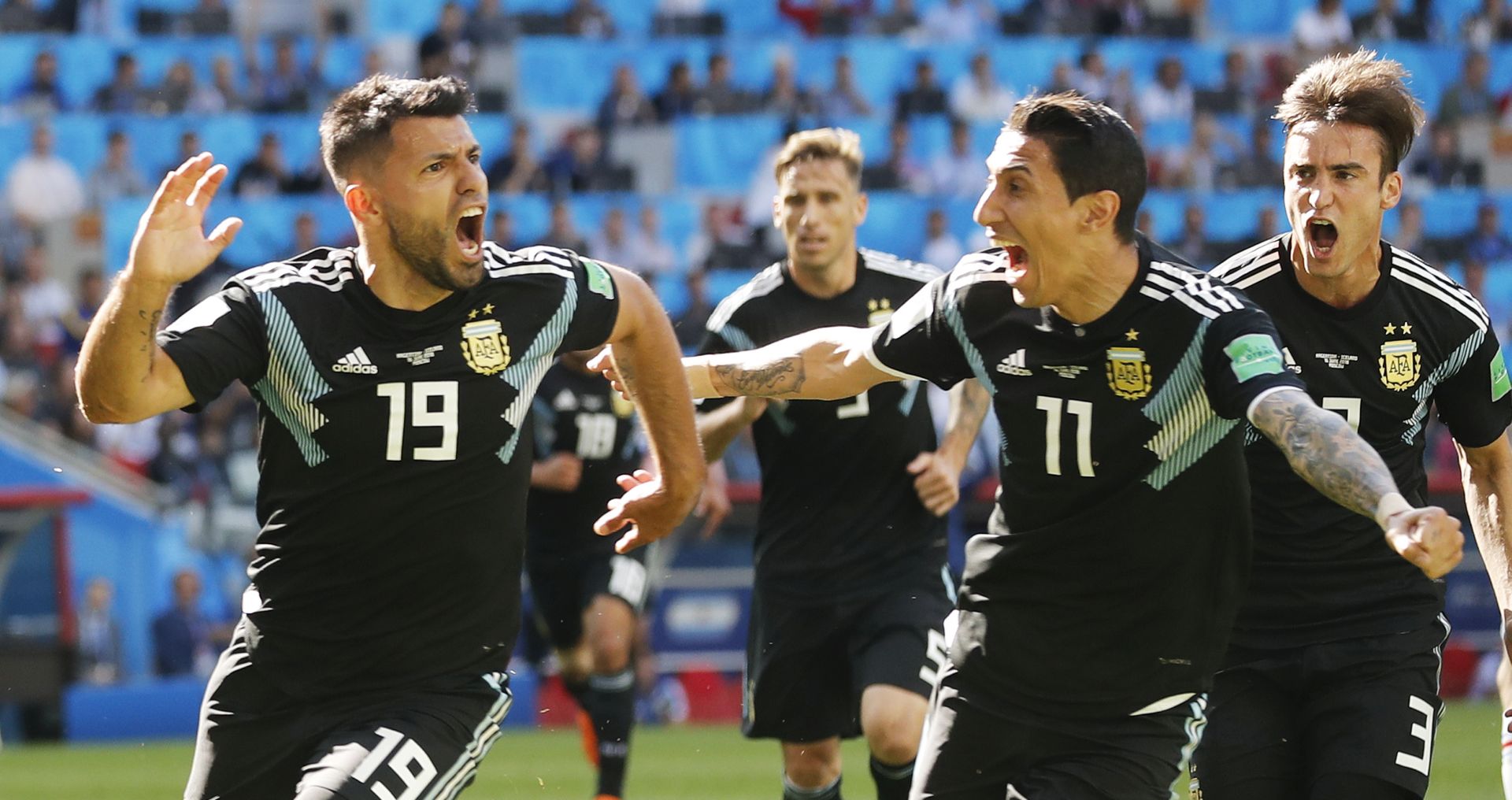 epa06812985 Sergio Aguero (L) of Argentina celebrates with teammate Angel Di Maria after scoring the opening goal during the FIFA World Cup 2018 group D preliminary round soccer match between Argentina and Iceland in Moscow, Russia, 16 June 2018.

(RESTRICTIONS APPLY: Editorial Use Only, not used in association with any commercial entity - Images must not be used in any form of alert service or push service of any kind including via mobile alert services, downloads to mobile devices or MMS messaging - Images must appear as still images and must not emulate match action video footage - No alteration is made to, and no text or image is superimposed over, any published image which: (a) intentionally obscures or removes a sponsor identification image; or (b) adds or overlays the commercial identification of any third party which is not officially associated with the FIFA World Cup)  EPA/Felipe Trueba   EDITORIAL USE ONLY