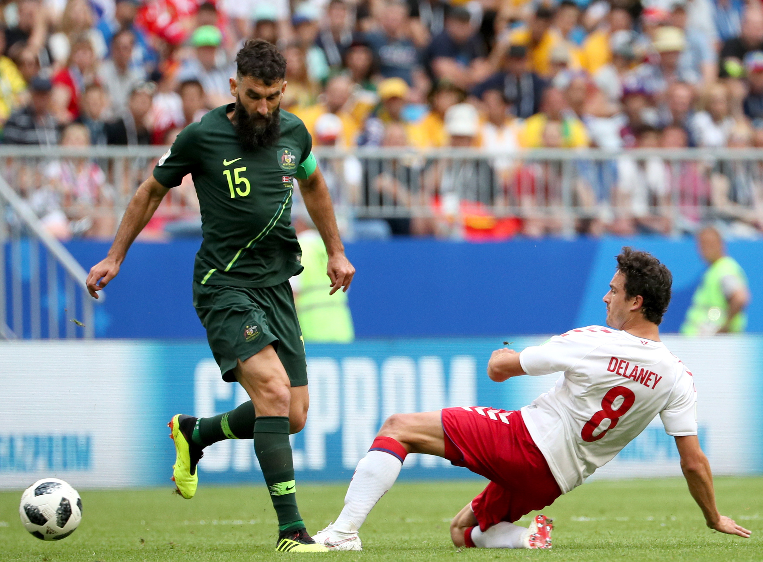 epa06827349 Mile Jedinak (L) of Australia and Thomas Delaney of Denmark in action during the FIFA World Cup 2018 group C preliminary round soccer match between Denmark and Australia in Samara, Russia, 21 June 2018.

(RESTRICTIONS APPLY: Editorial Use Only, not used in association with any commercial entity - Images must not be used in any form of alert service or push service of any kind including via mobile alert services, downloads to mobile devices or MMS messaging - Images must appear as still images and must not emulate match action video footage - No alteration is made to, and no text or image is superimposed over, any published image which: (a) intentionally obscures or removes a sponsor identification image; or (b) adds or overlays the commercial identification of any third party which is not officially associated with the FIFA World Cup)  EPA/WALLACE WOON   EDITORIAL USE ONLY