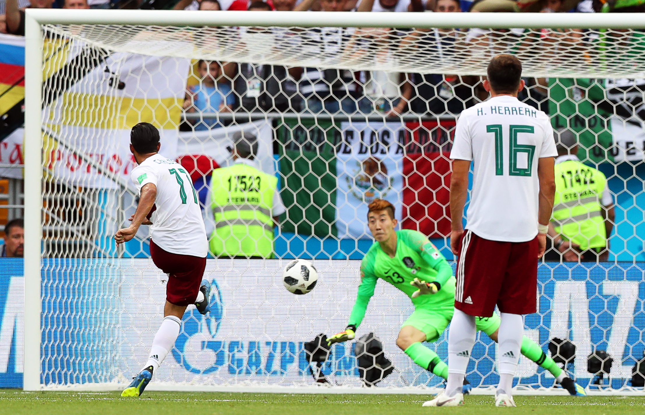 epa06833836 Carlos Vela (L) of Mexico scores the 1-0 lead from the penalty spot against South Korea's goalkeeper Jo Hyeon-woo (C) during the FIFA World Cup 2018 group F preliminary round soccer match between South Korea and Mexico in Rostov-On-Don, Russia, 23 June 2018.

(RESTRICTIONS APPLY: Editorial Use Only, not used in association with any commercial entity - Images must not be used in any form of alert service or push service of any kind including via mobile alert services, downloads to mobile devices or MMS messaging - Images must appear as still images and must not emulate match action video footage - No alteration is made to, and no text or image is superimposed over, any published image which: (a) intentionally obscures or removes a sponsor identification image; or (b) adds or overlays the commercial identification of any third party which is not officially associated with the FIFA World Cup)  EPA/KHALED ELFIQI   EDITORIAL USE ONLY