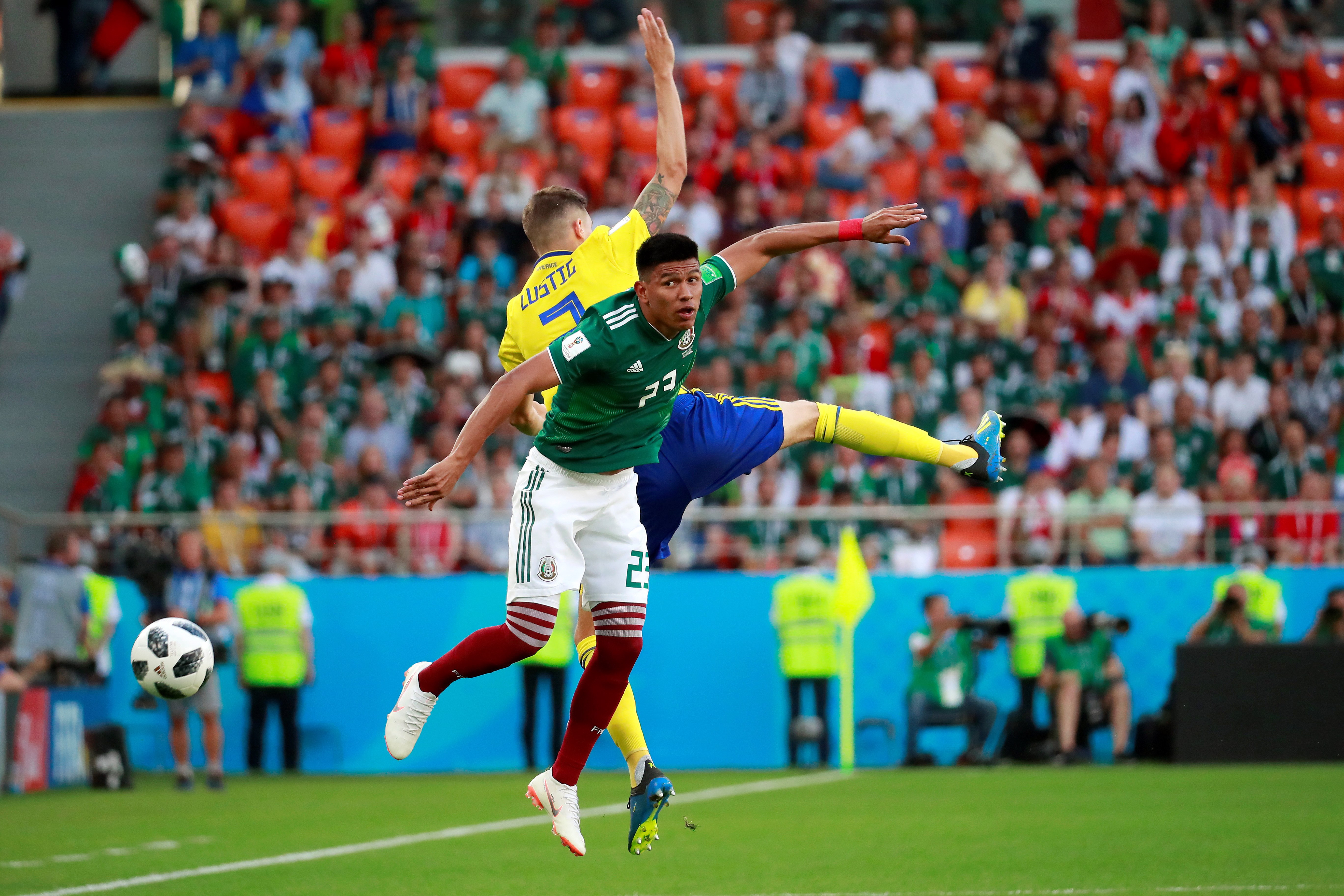 epa06844214 Mexican forward Jesus Gallardo (R) and Swedish defender Mikael Lust in action during the FIFA World Cup 2018 Group F soccer match between Mexico and Sweden, in Ekaterinburg, Russia, 27 June 2018. 

(RESTRICTIONS APPLY: Editorial Use Only, not used in association with any commercial entity - Images must not be used in any form of alert service or push service of any kind including via mobile alert services, downloads to mobile devices or MMS messaging - Images must appear as still images and must not emulate match action video footage - No alteration is made to, and no text or image is superimposed over, any published image which: (a) intentionally obscures or removes a sponsor identification image; or (b) adds or overlays the commercial identification of any third party which is not officially associated with the FIFA World Cup)  EPA/Jose Mendez   EDITORIAL USE ONLY