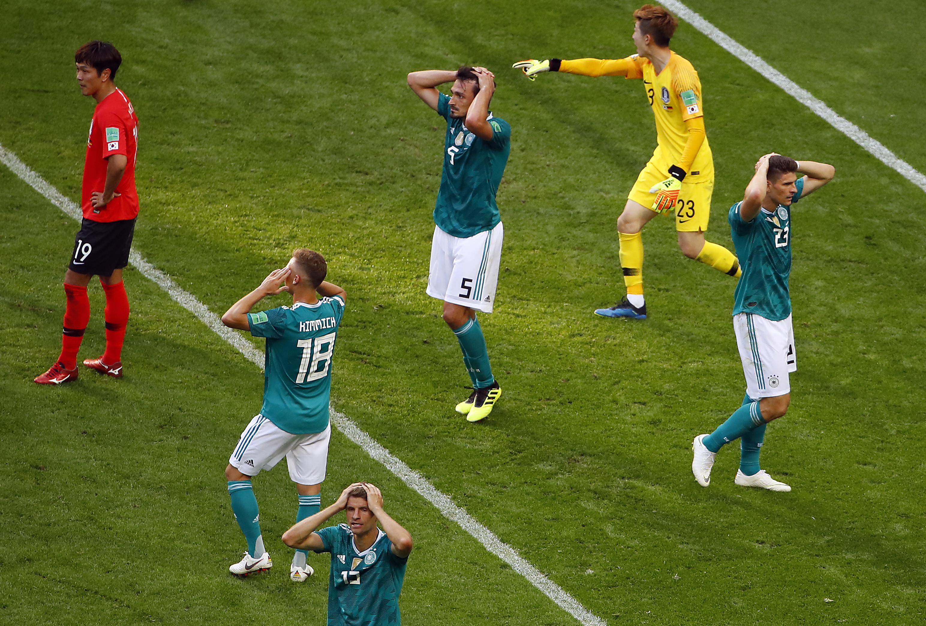 epa06844707 Mats Hummels of Germany (C) reacts with teammates after missing a goal opportunity during the FIFA World Cup 2018 group F preliminary round soccer match between South Korea and Germany in Kazan, Russia, 27 June 2018.

(RESTRICTIONS APPLY: Editorial Use Only, not used in association with any commercial entity - Images must not be used in any form of alert service or push service of any kind including via mobile alert services, downloads to mobile devices or MMS messaging - Images must appear as still images and must not emulate match action video footage - No alteration is made to, and no text or image is superimposed over, any published image which: (a) intentionally obscures or removes a sponsor identification image; or (b) adds or overlays the commercial identification of any third party which is not officially associated with the FIFA World Cup)  EPA/DIEGO AZUBEL   EDITORIAL USE ONLY  EDITORIAL USE ONLY